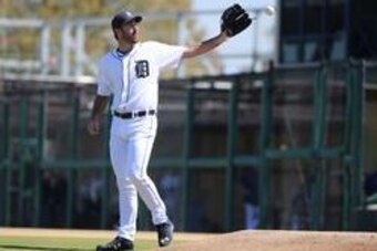 Mar 4, 2016; Lakeland, FL, USA; Detroit Tigers starting pitcher Justin Verlander (35) catches the ball after he gives up a walk against the New York Yankees at Joker Marchant Stadium. Mandatory Credit: Kim Klement-USA TODAY Sports