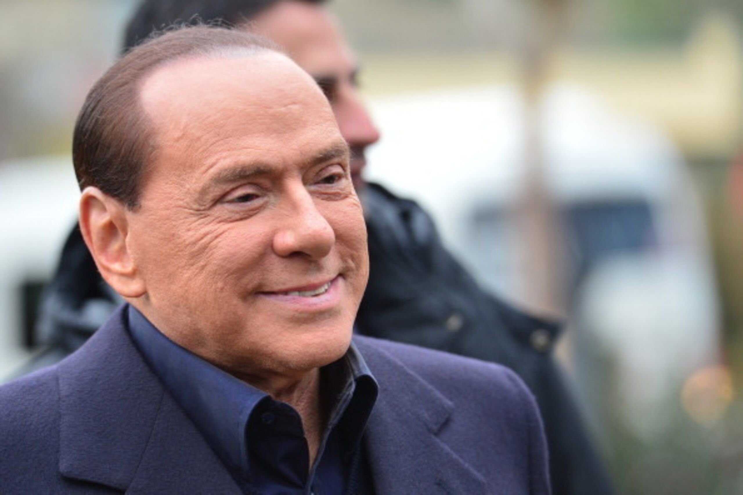 Italian former prime minister and owner of the AC Milan football team, Silvio Berlusconi, arrives at the AC Milan training grounds in Milanello on December 8 , 2012. Prime Minister Mario Monti's government hung by a thread the day before as predecessor Si