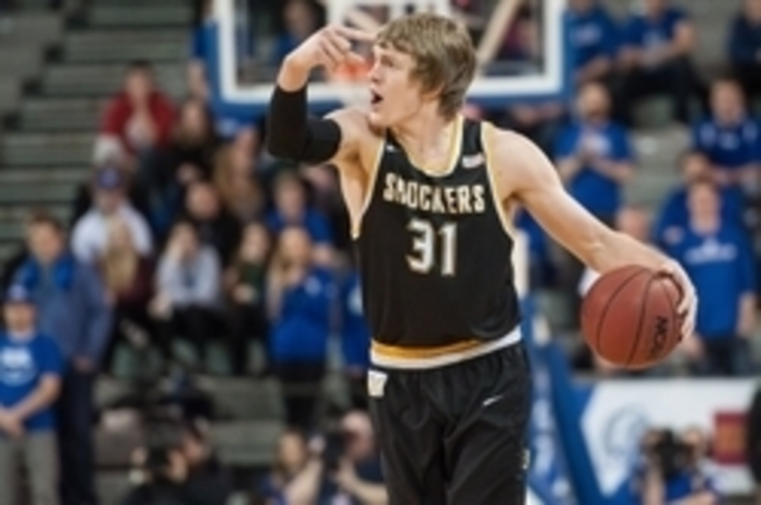 Feb 9, 2016; Des Moines, IA, USA; Wichita State Shockers guard Ron Baker (31) gestures from the court against the Drake Bulldogs during the first half at Knapp Center. Mandatory Credit: Jeffrey Becker-USA TODAY Sports