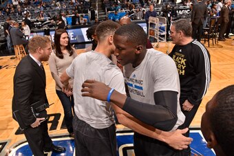 ORLANDO, FL - FEBRUARY 25:  Stephen Curry #30 of the Golden State Warriors and Victor Oladipo #5 of the Orlando Magic greet each other before the game on February 25, 2016 at Amway Center in Orlando, Florida. NOTE TO USER: User expressly acknowledges and