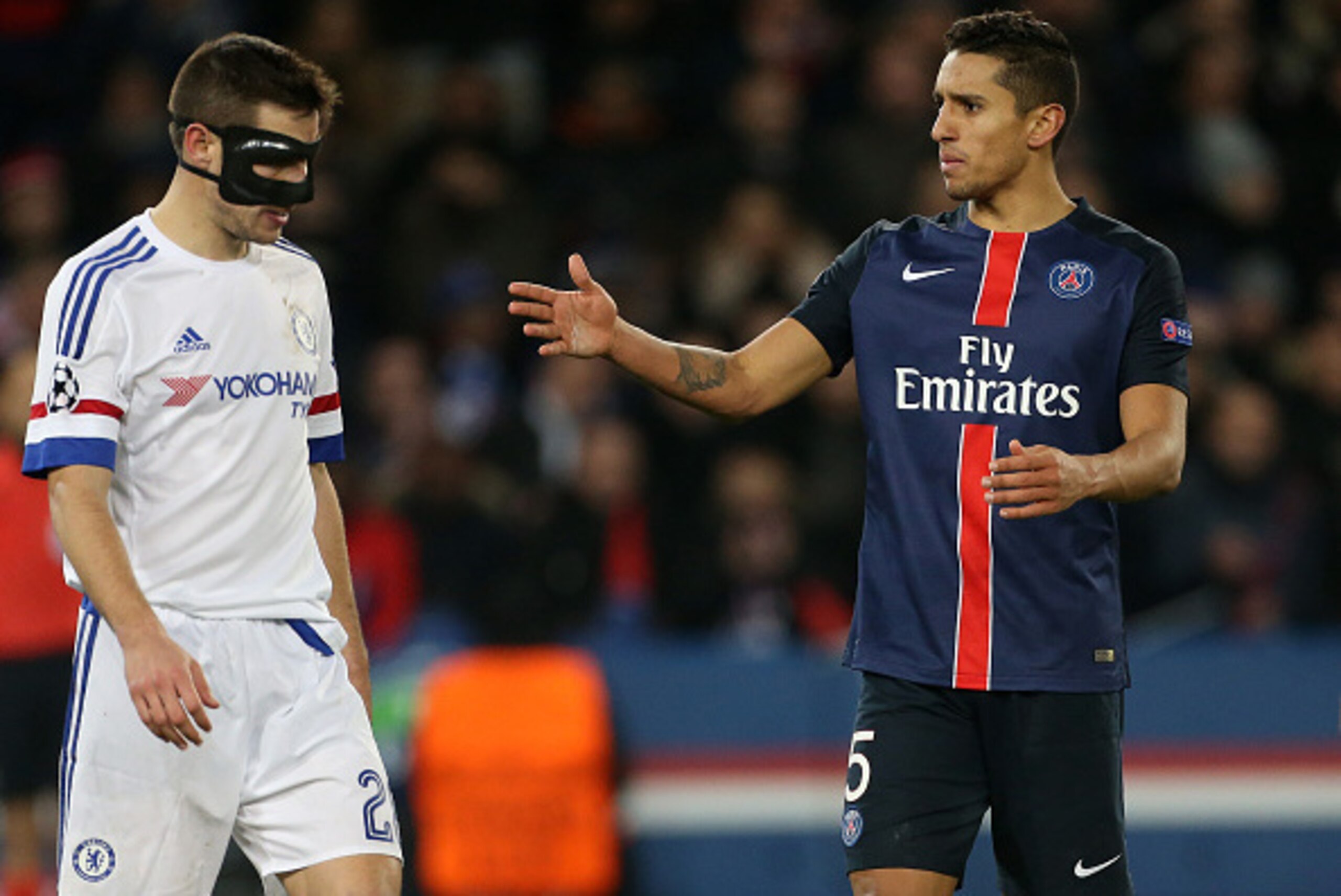 PARIS - FEBRUARY 16: Marquinhos of PSG (right) and Cesar Azpilicueta of Chelsea react during the UEFA Champions League round of 16 first leg match between Paris Saint-Germain (PSG) and Chelsea FC at Parc des Princes stadium on February 16, 2016 in Paris, 
