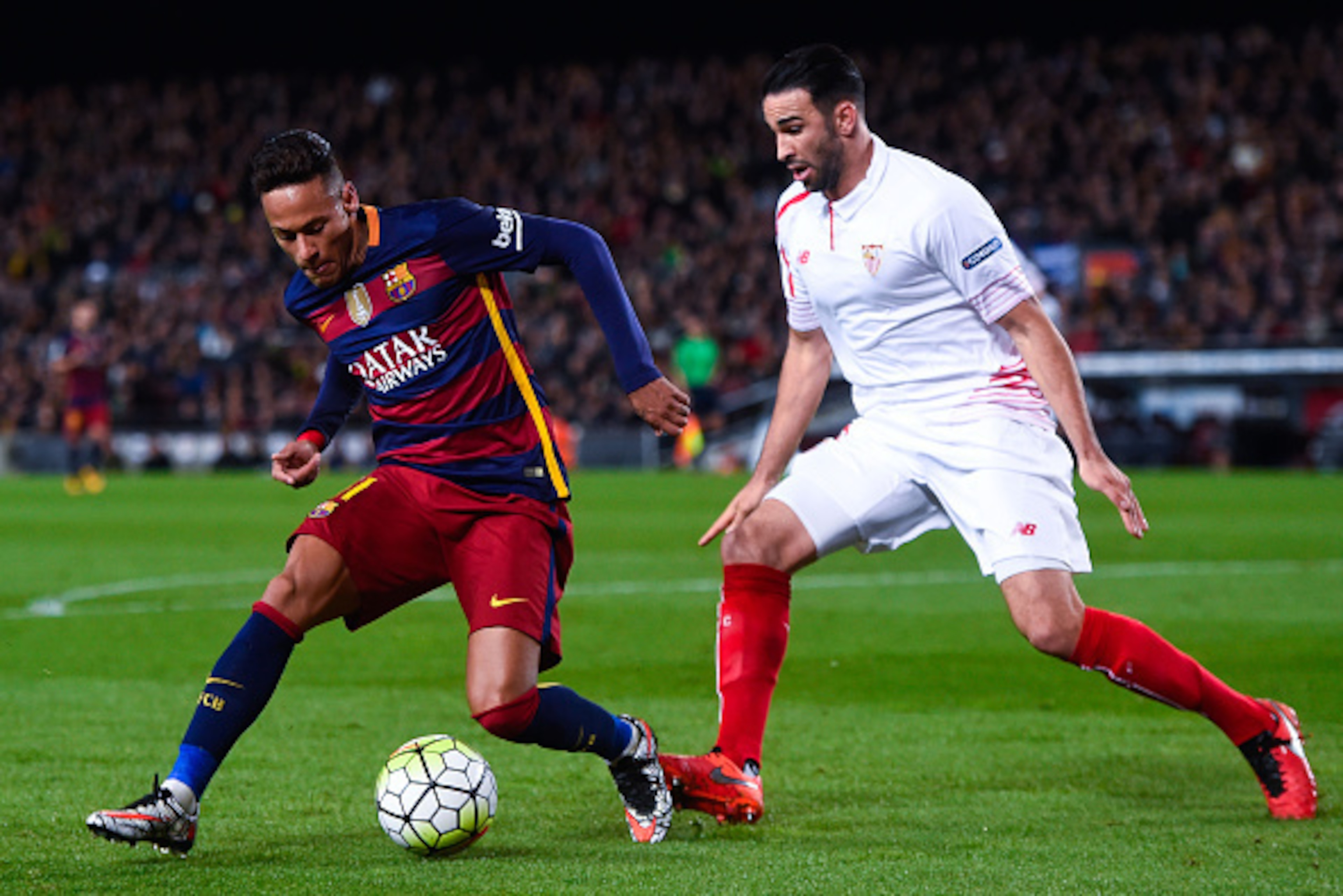 BARCELONA, SPAIN - FEBRUARY 28: Neymar of FC Barcelona competes for the ball with Adil Rami of Sevilla FC during the La Liga match between FC Barcelona and Sevilla FC at Camp Nou on February 28, 2016 in Barcelona, Spain. (Photo by David Ramos/Getty Imag BARCELONA, SPAIN - FEBRUARY 28: Neymar of FC Barcelona competes for the ball with Adil Rami of Sevilla FC during the La Liga match between FC Barcelona and Sevilla FC at Camp Nou on February 28, 2016 in Barcelona, Spain. (Photo by David Ramos/Getty Imag