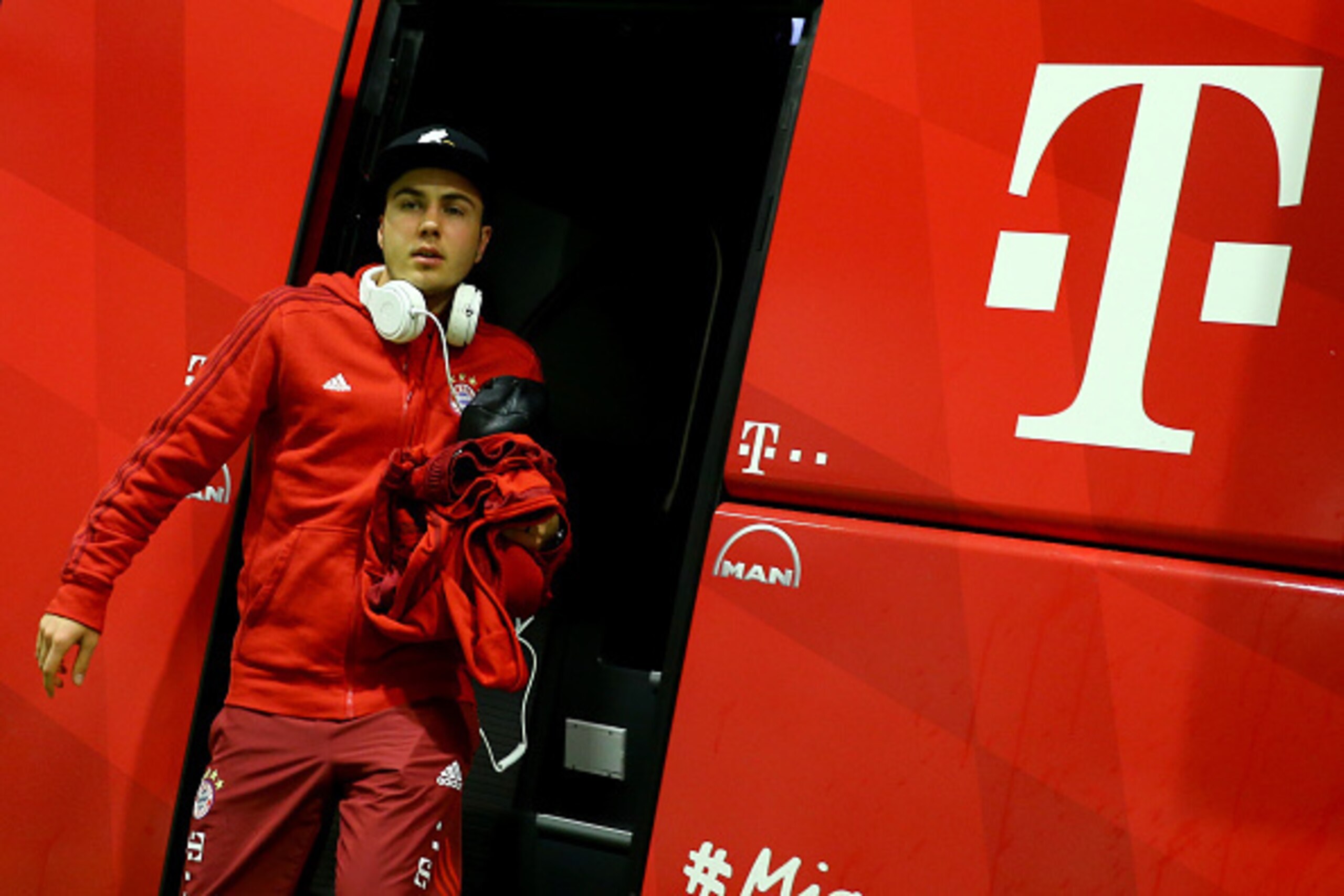 DORTMUND, GERMANY - MARCH 05:  Mari Goetze of Bayern walks out of the bus prior to the Bundesliga match between Borussia Dortmund and FC Bayern Muenchen at Signal Iduna Park on March 5, 2016 in Dortmund, Germany.  (Photo by Christof Koepsel/Getty Images  