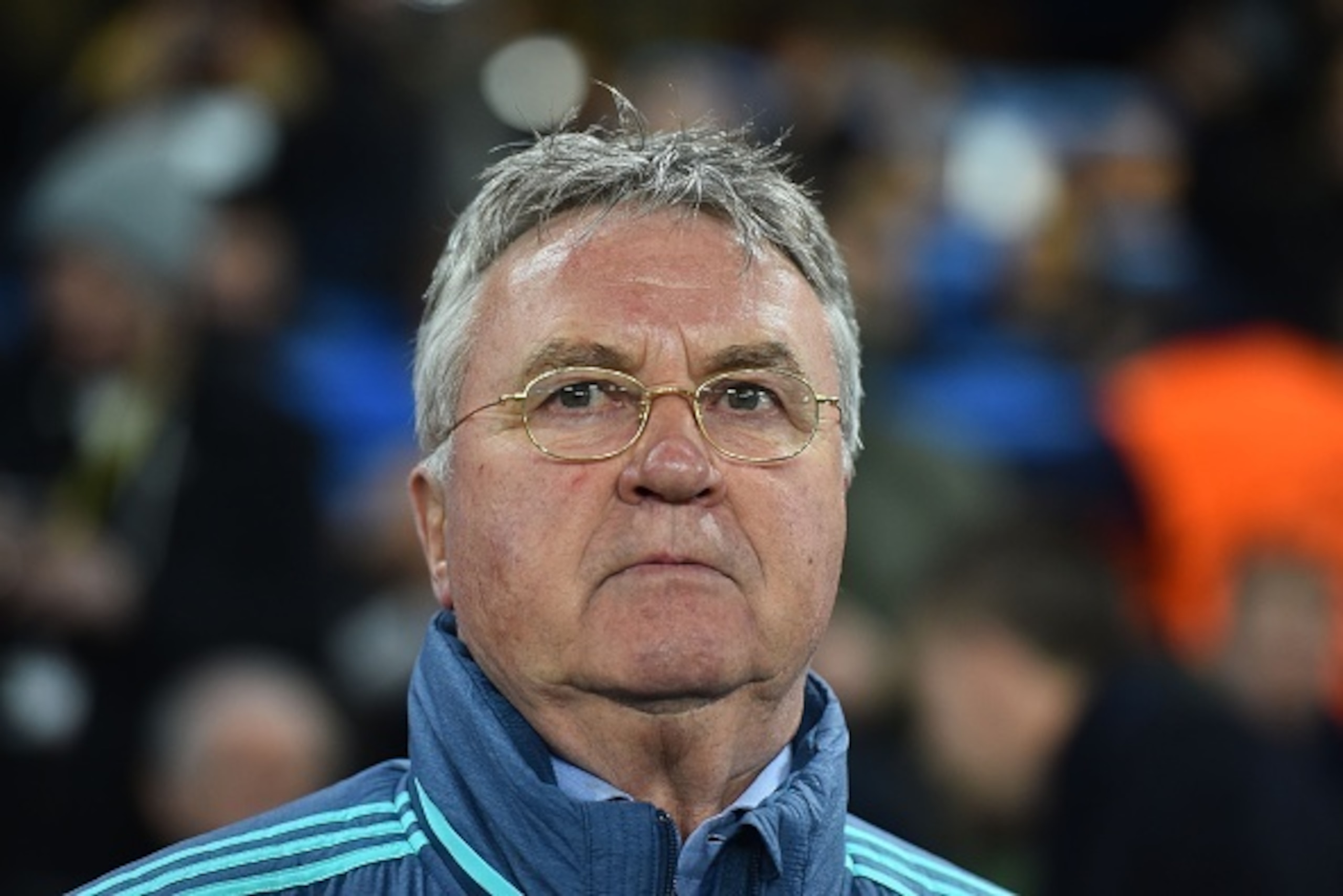 Chelsea's Dutch interim manager Guus Hiddink arrives for the UEFA Champions League round of 16 second leg football match between Chelsea and Paris Saint-Germain (PSG) at Stamford Bridge in London on March 9, 2016.  / AFP / BEN STANSALL        (Photo credi