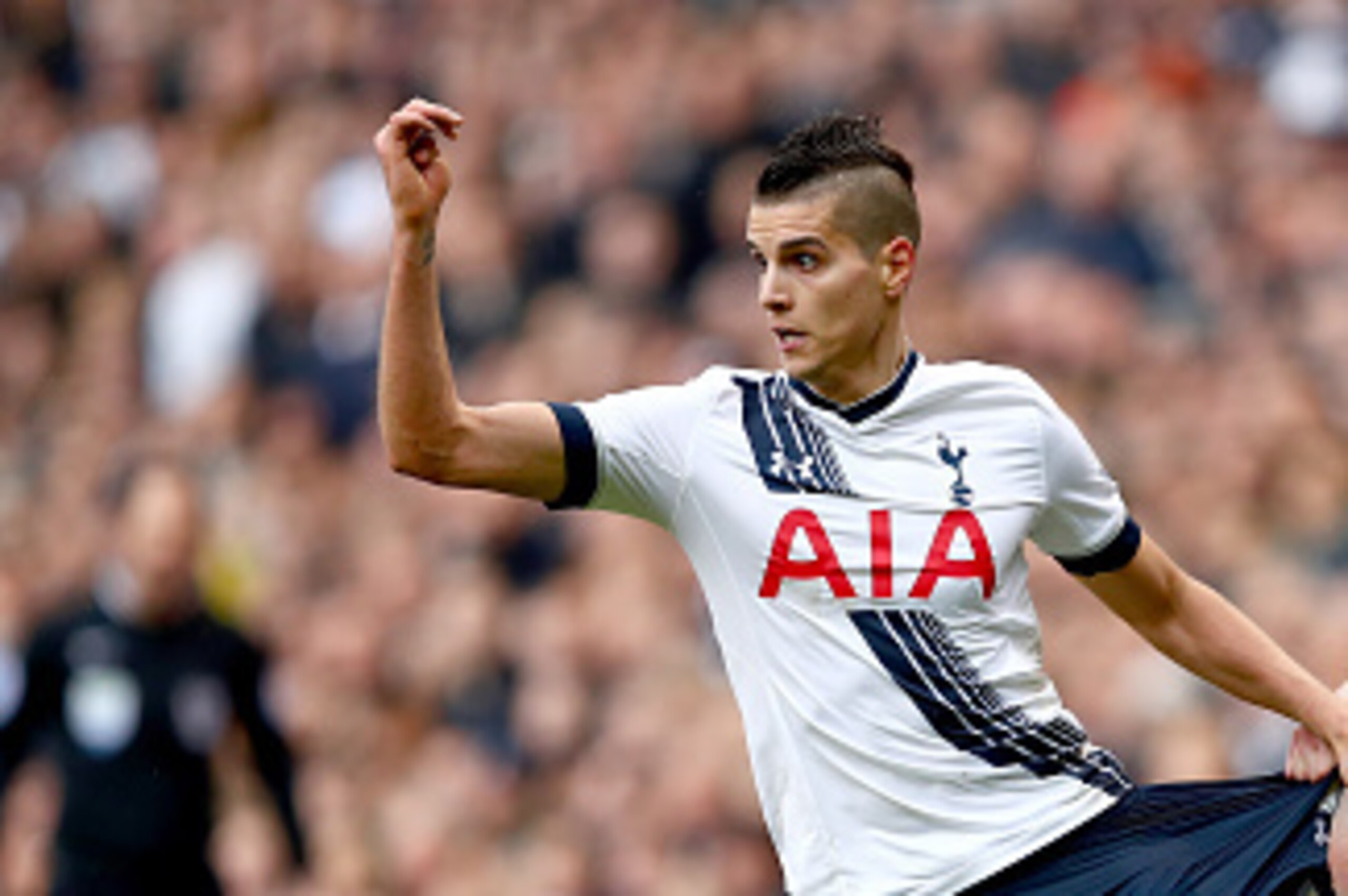 LONDON, ENGLAND - MARCH 05:  Erik Lamela of Tottenham Hotspur has his shorts pulled by Hector Bellerin of Arsenal during the Barclays Premier League match between Tottenham Hotspur and Arsenal at White Hart Lane on March 5, 2016 in London, England.  (Phot