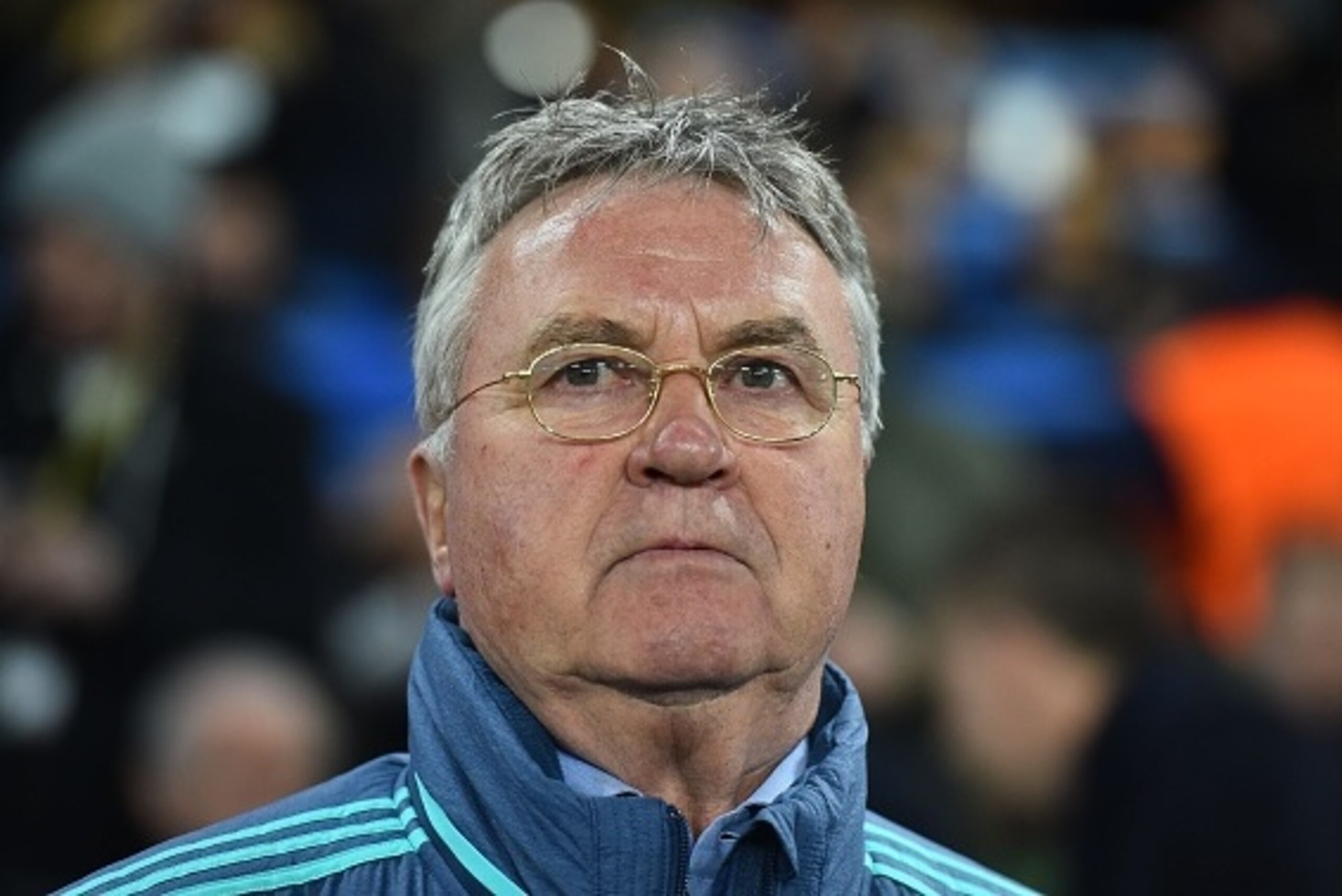 Chelsea's Dutch interim manager Guus Hiddink arrives for the UEFA Champions League round of 16 second leg football match between Chelsea and Paris Saint-Germain (PSG) at Stamford Bridge in London on March 9, 2016.  / AFP / BEN STANSALL        (Photo credi