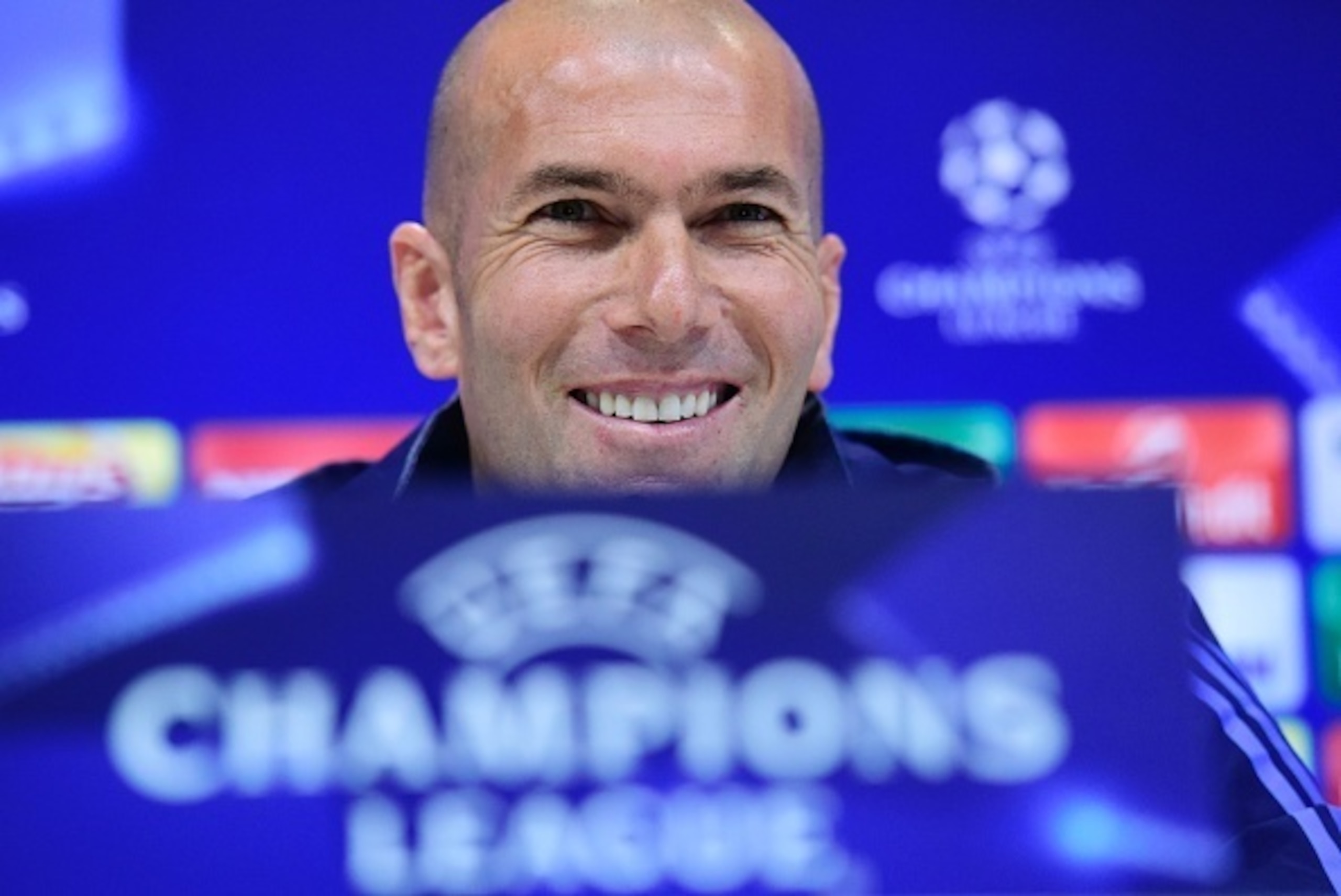 Real Madrid's French coach Zinedine Zidane sits during a press conference on March 7, 2016 at Real Madrid Sport City in Madrid on the eve of their UEFA Champions League football match Real Madrid CF vs AS Roma  / AFP / JAVIER SORIANO        (Photo credit 