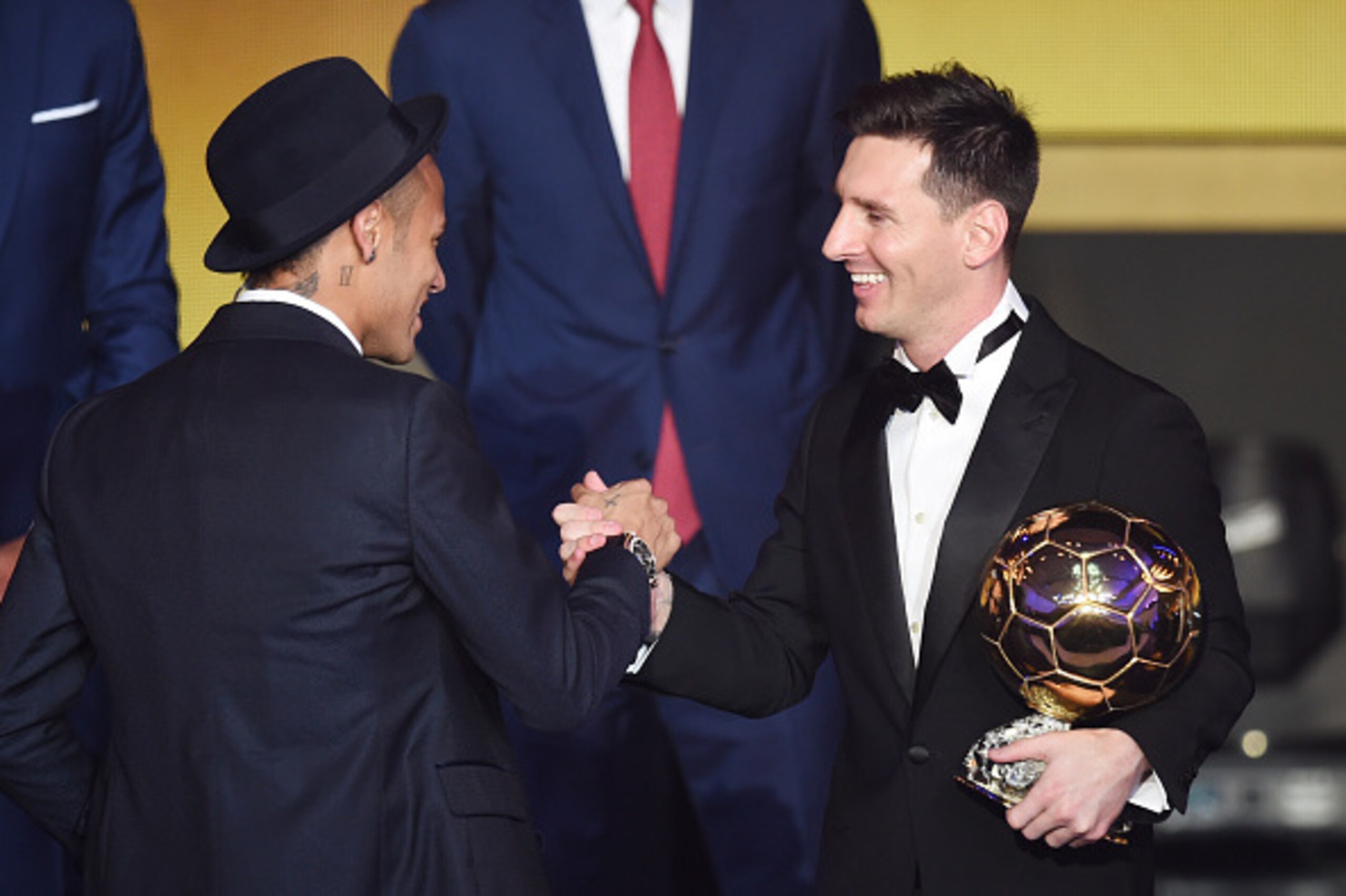 ZURICH, SWITZERLAND - JANUARY 11:  Lionel Messi of Argentina and FC Barcelona the winner of the Ballon d'or is congratulated by Neymar Jr of Brazil and FC Barcelona during the FIFA Ballon d'Or Gala 2015 at the Kongresshaus on January 11, 2016 in Zurich, S