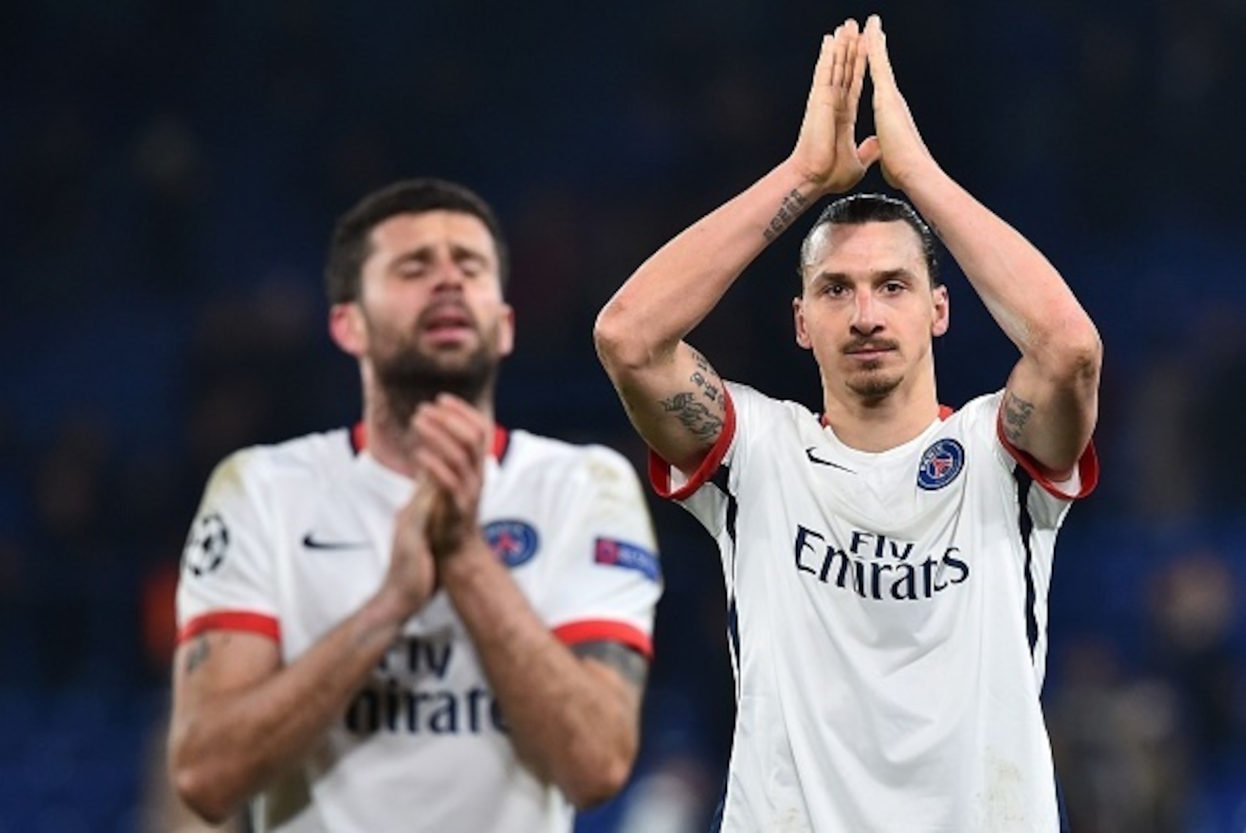 Paris Saint-Germain's Swedish forward Zlatan Ibrahimovic waves to the crowd after his team won the UEFA Champions League round of 16 second leg football match between Chelsea and Paris Saint-Germain (PSG) at Stamford Bridge in London on March 9, 2016.  / 