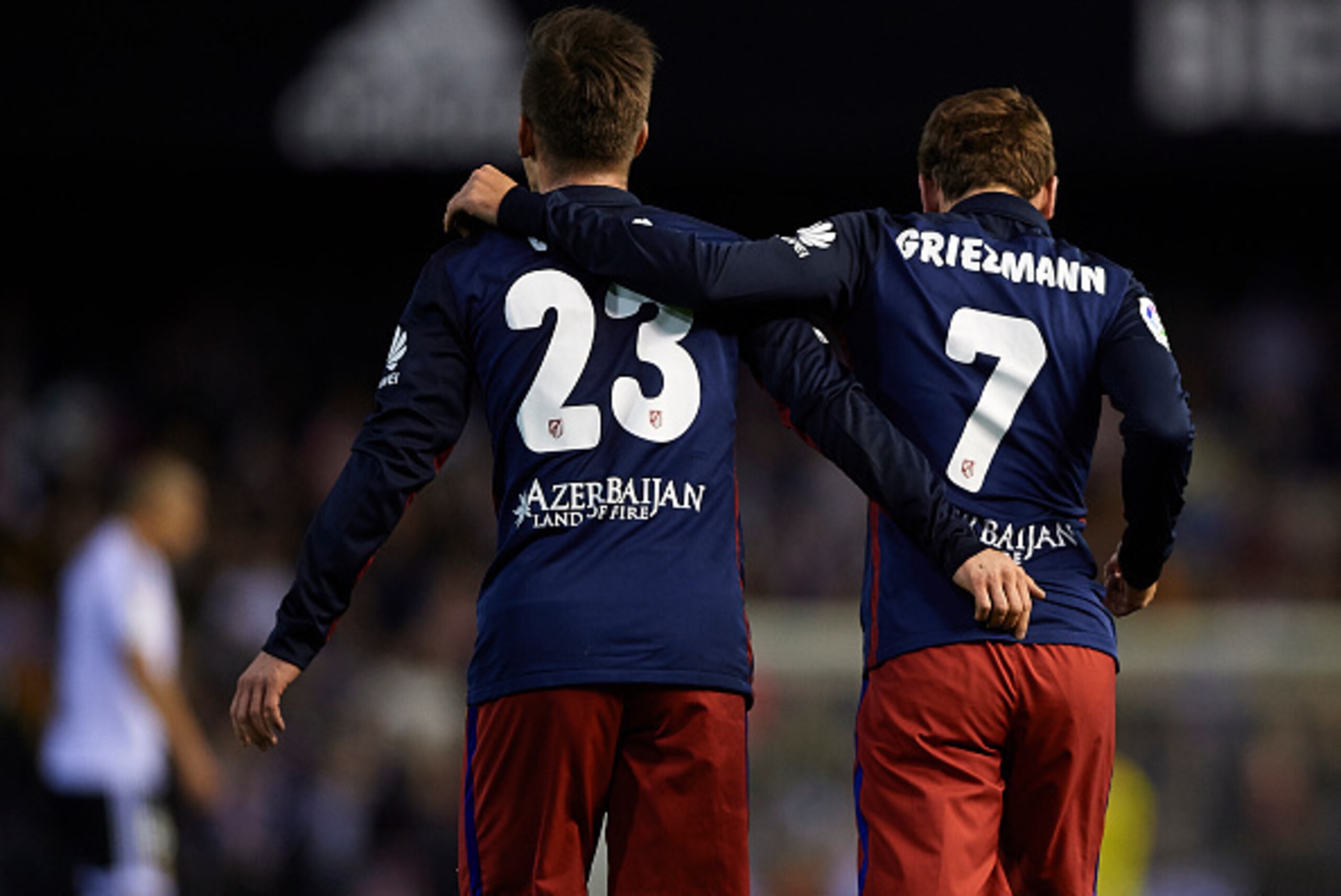VALENCIA, SPAIN - MARCH 06:  Antoine Griezmann (R) of Atletico de Madrid celebrates scoring his team's first goal with his teammate Luciano Vietto during the La Liga match between Valencia CF and Atletico de Madrid at Estadi de Mestalla on March 06, 2016 