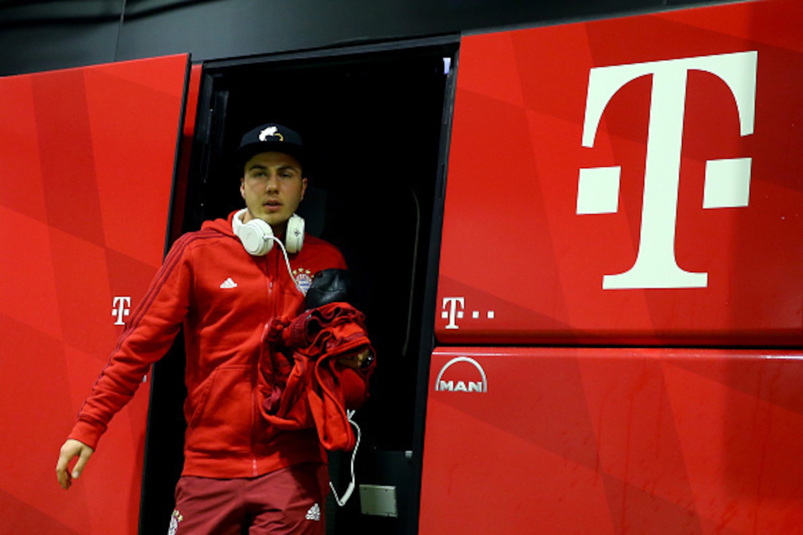 DORTMUND, GERMANY - MARCH 05: Mario Goetze of Bayern leaves the bus prior to the Bundesliga match between Borussia Dortmund and FC Bayern Muenchen at Signal Iduna Park on March 5, 2016 in Dortmund, Germany.  (Photo by Christof Koepsel/Getty Images  For MA