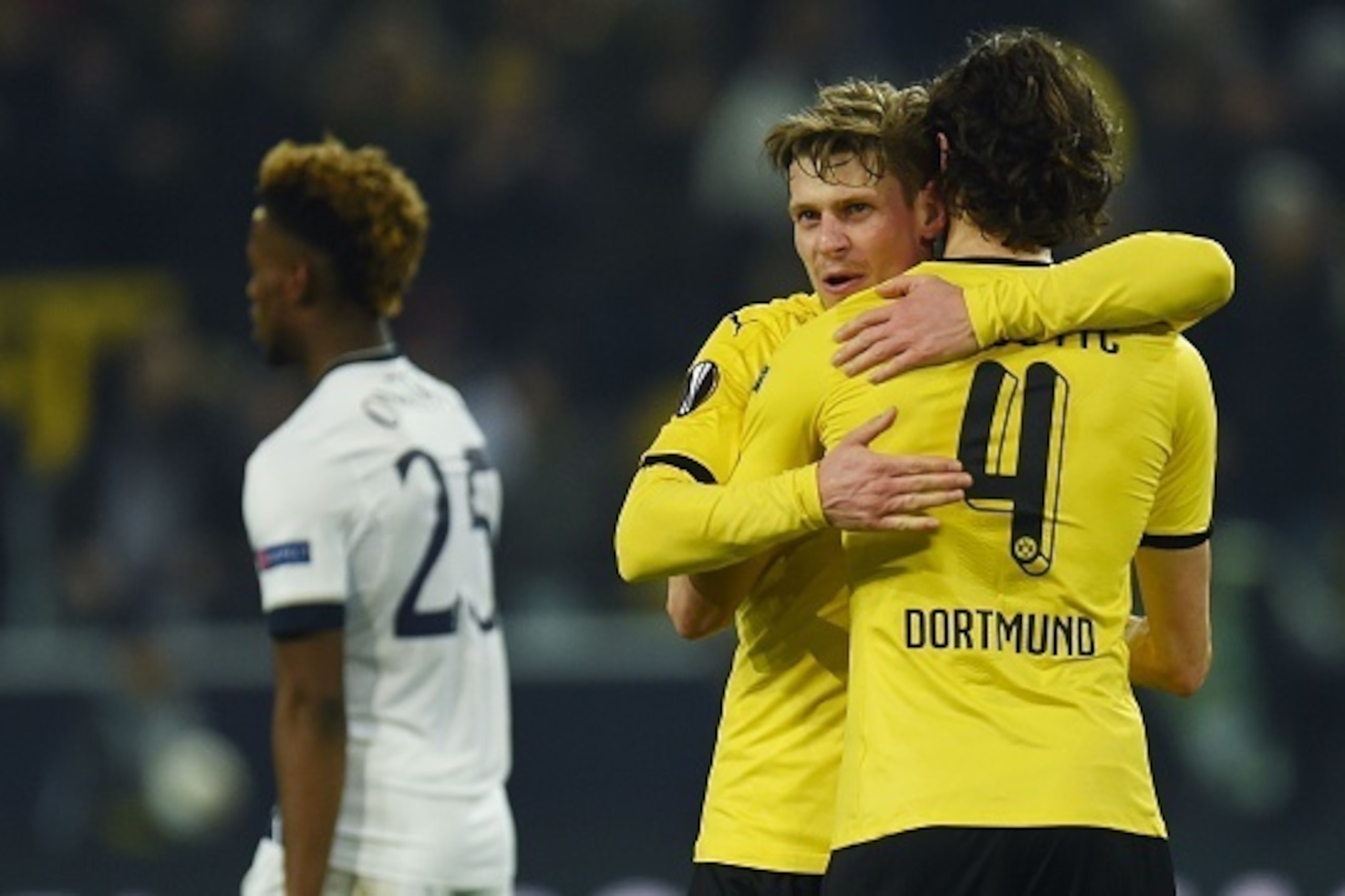 Dortmund's Serbian defender Neven Subotic (R) and Dortmund's Polish defender Lukasz Piszczek react after the UEFA Europe League Round of 16 first leg football match between Borussia Dortmund and Tottenham Hotspurs in Dortmund , western Germany on March 10