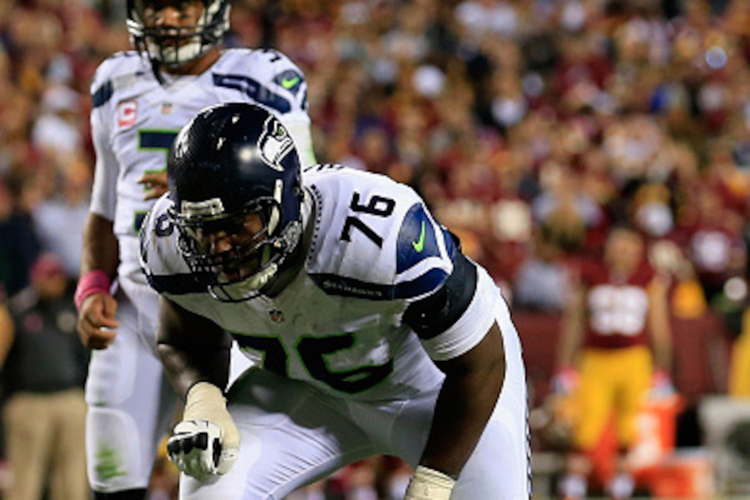 LANDOVER, MD - OCTOBER 06: Tackle Russell Okung #76 of the Seattle Seahawks lines up against the Washington Redskins in the second half at FedExField on October 6, 2014 in Landover, Maryland.  (Photo by Rob Carr/Getty Images)