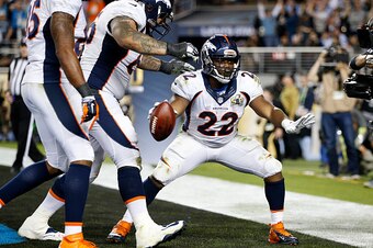 SANTA CLARA, CA - FEBRUARY 07:  C.J. Anderson #22 of the Denver Broncos celebrates after scoring a 2-yard touchdown in the fourth quarter against the Carolina Panthers during Super Bowl 50 at Levi's Stadium on February 7, 2016 in Santa Clara, California. 