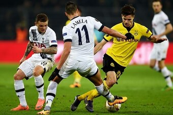 Dortmund's midfielder Julian Weigl vies with Tottenham´s Erik Lamela during the UEFA Europe League Round of 16 first leg football match between Borussia Dortmund and Tottenham Hotspurs in Dortmund, western Germany on March 10, 2016. 
Dortmund won the matc