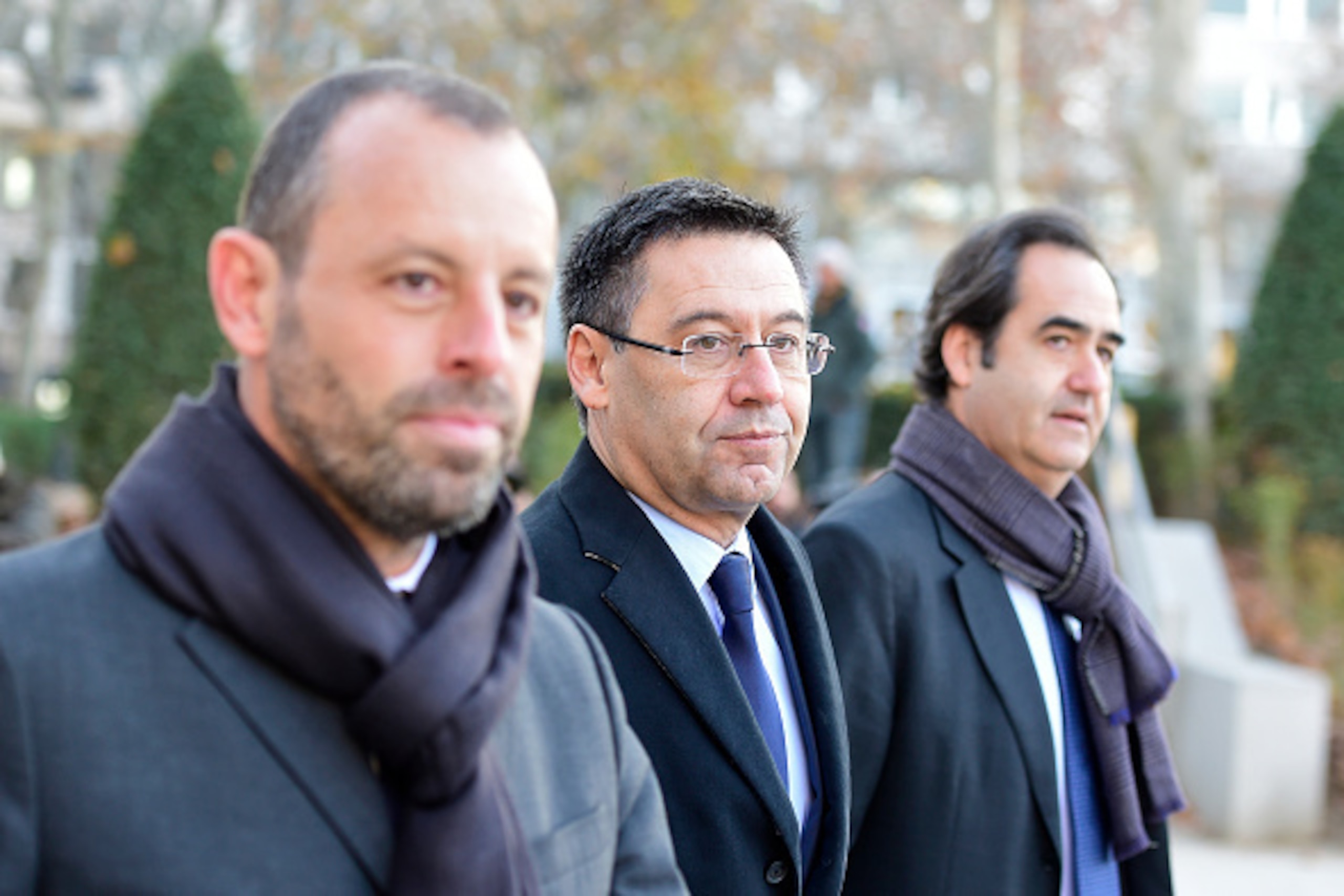 (FromL) Barcelona's former president Sandro Rosell, Barcelona's president Josep Maria Bartomeu and Barcelona's general director Ignacio Mestre arrive to attend Spain's national court in Madrid on February 1, 2016. A Spanish judge on May 13, 2015 ordered B
