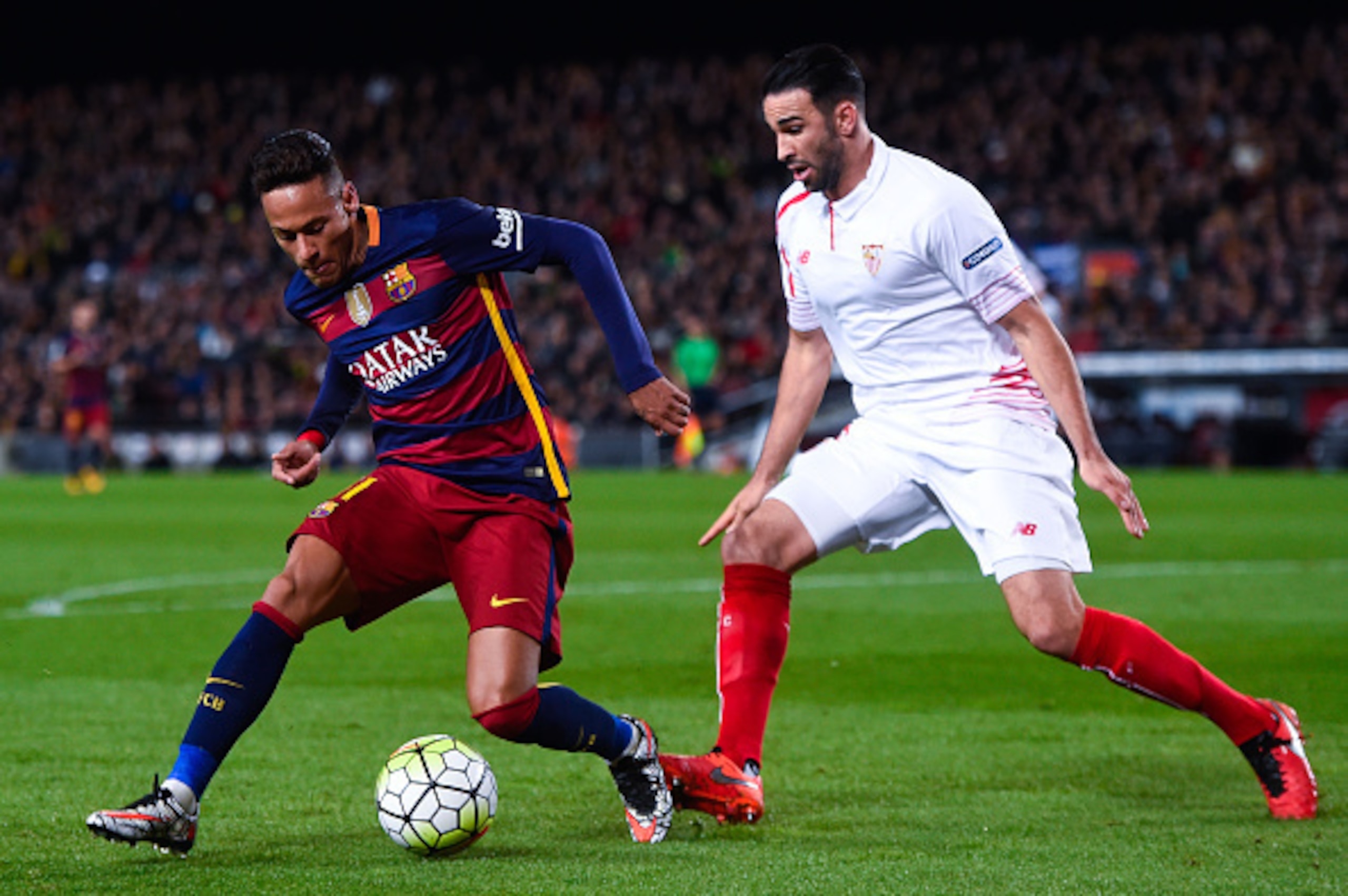 BARCELONA, SPAIN - FEBRUARY 28: Neymar of FC Barcelona competes for the ball with Adil Rami of Sevilla FC during the La Liga match between FC Barcelona and Sevilla FC at Camp Nou on February 28, 2016 in Barcelona, Spain. (Photo by David Ramos/Getty Imag BARCELONA, SPAIN - FEBRUARY 28: Neymar of FC Barcelona competes for the ball with Adil Rami of Sevilla FC during the La Liga match between FC Barcelona and Sevilla FC at Camp Nou on February 28, 2016 in Barcelona, Spain. (Photo by David Ramos/Getty Imag