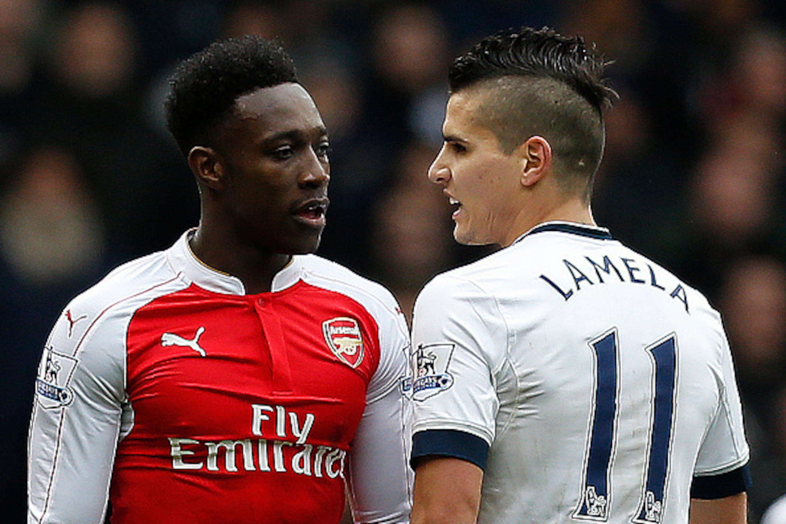 Tottenham Hotspur's Argentinian midfielder Erik Lamela (R) remonstrates with Arsenal's English striker Danny Welbeck during the English Premier League football match between Tottenham Hotspur and Arsenal at White Hart Lane in London, on March 5, 2016.
Lam