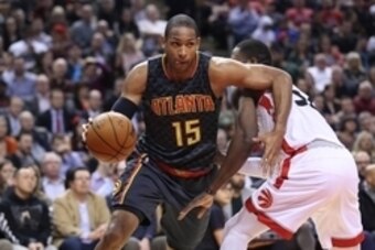 Mar 10, 2016; Toronto, Ontario, CAN; Atlanta Hawks forward Al Horford (15) goes to the basket against the Toronto Raptors at Air Canada Centre. The Raptors beat the Hawks 104-96. Mandatory Credit: Tom Szczerbowski-USA TODAY Sports