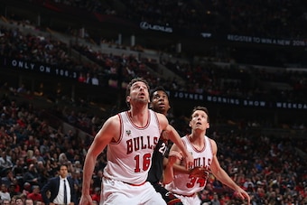 CHICAGO, IL - MARCH 11:  Hassan Whiteside #21 of the Miami Heat fights for position against Pau Gasol #16 of the Chicago Bulls and Mike Dunleavy #34 of the Chicago Bulls on March 11, 2016 at the United Center in Chicago, Illinois. NOTE TO USER: User expre