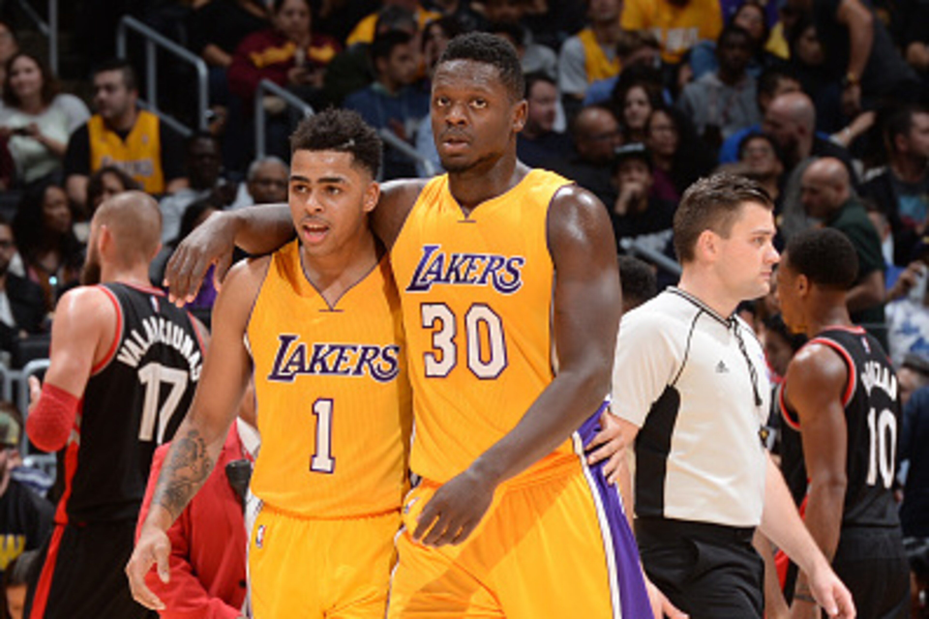 LOS ANGELES, CA - NOVEMBER 20:  Julius Randle #30 of the Los Angeles Lakers and D'Angelo Russell #1 of the Los Angeles Lakers talk during the game against the Toronto Raptors on November 20, 2015 at STAPLES Center in Los Angeles, California. NOTE TO USER: