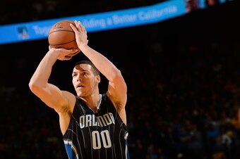 OAKLAND, CA - MARCH 7: Aaron Gordon #00 of the Orlando Magic shoots against the Golden State Warriors during the game on March 7, 2016 at ORACLE Arena in Oakland, California. NOTE TO USER: User expressly acknowledges and agrees that, by downloading and or