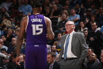 DENVER, CO - FEBRUARY 23:  Head coach George Karl of the Sacramento Kings talks to DeMarcus Cousins #15 of the Sacramento Kings as they face the Denver Nuggets at Pepsi Center on February 23, 2016 in Denver, Colorado. The Kings defeated the Nuggets 114-11