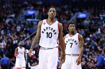 TORONTO, ON - MARCH 06:  DeMar DeRozan #10 and Kyle Lowry #7 of the Toronto Raptors look on during the second half of an NBA game against the Houston Rockets at the Air Canada Centre on March 06, 2016 in Toronto, Ontario, Canada.  NOTE TO USER: User expre