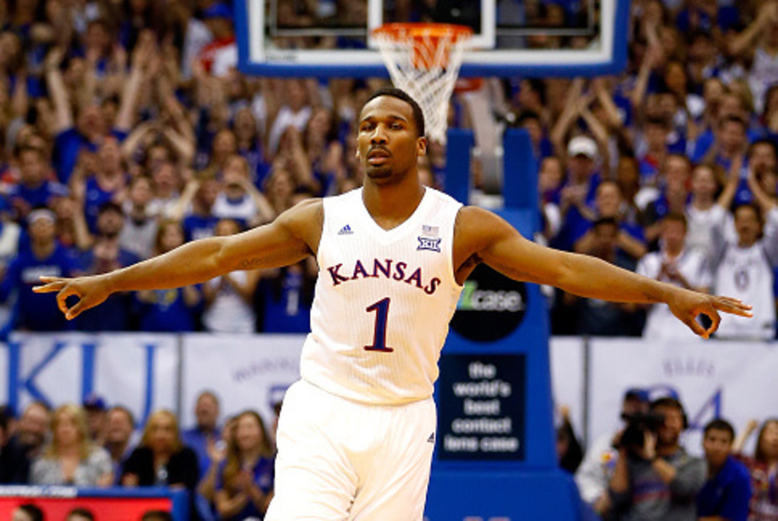 LAWRENCE, KS - MARCH 05:  Wayne Selden Jr. #1 of the Kansas Jayhawks reacts after making a three-pointer during the game against the Iowa State Cyclones at Allen Fieldhouse on March 5, 2016 in Lawrence, Kansas.  (Photo by Jamie Squire/Getty Images)