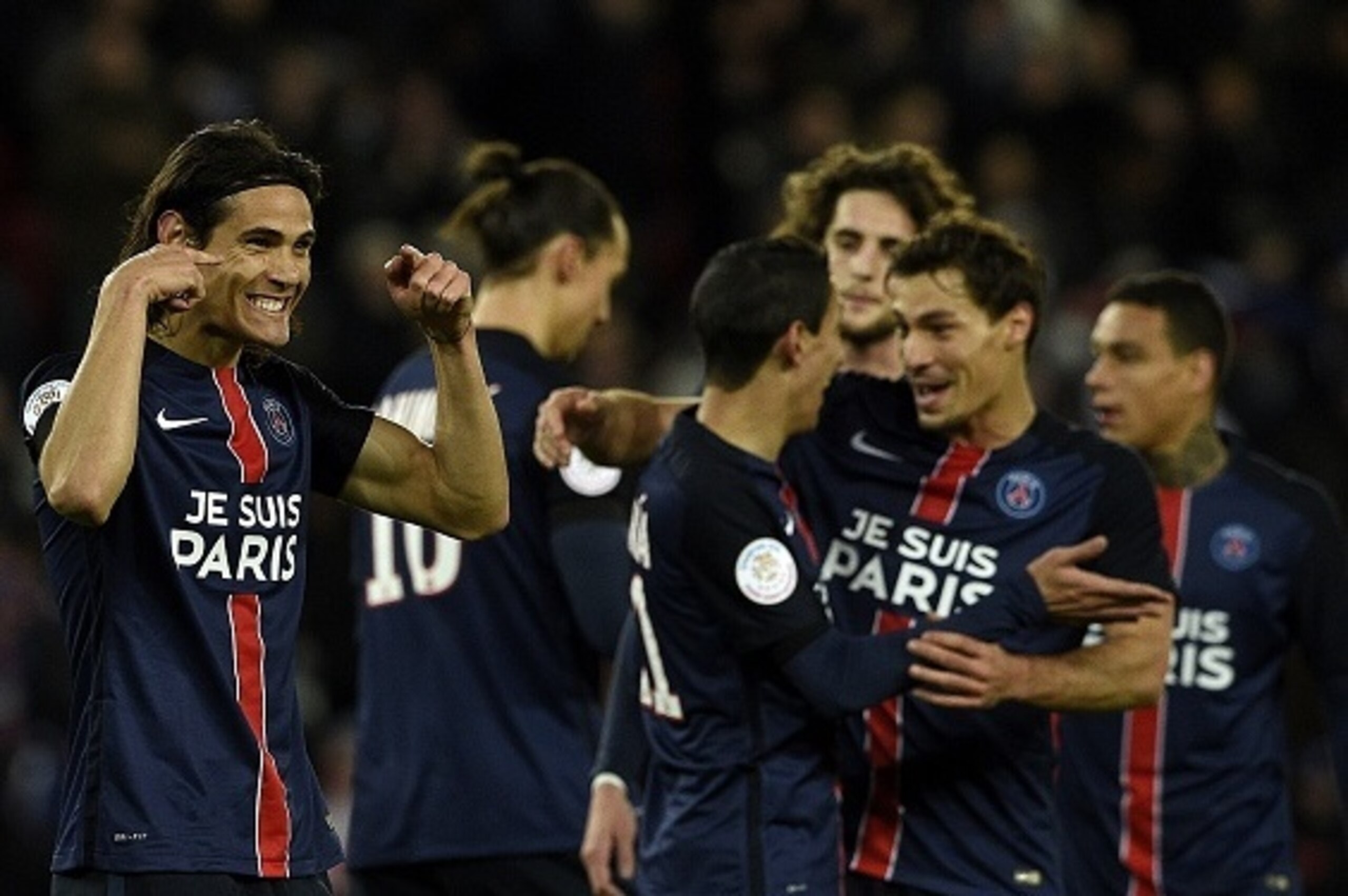 Paris Saint-Germain's Uruguyan forward Edinson Cavani (L) celebrates next to teammates after scoring a goal during the French L1 football match between Paris Saint-Germain (PSG) and Troyes at the Parc des Princes stadium in Paris on November 28, 2015. AFP Paris Saint-Germain's Uruguyan forward Edinson Cavani (L) celebrates next to teammates after scoring a goal during the French L1 football match between Paris Saint-Germain (PSG) and Troyes at the Parc des Princes stadium in Paris on November 28, 2015. AFP