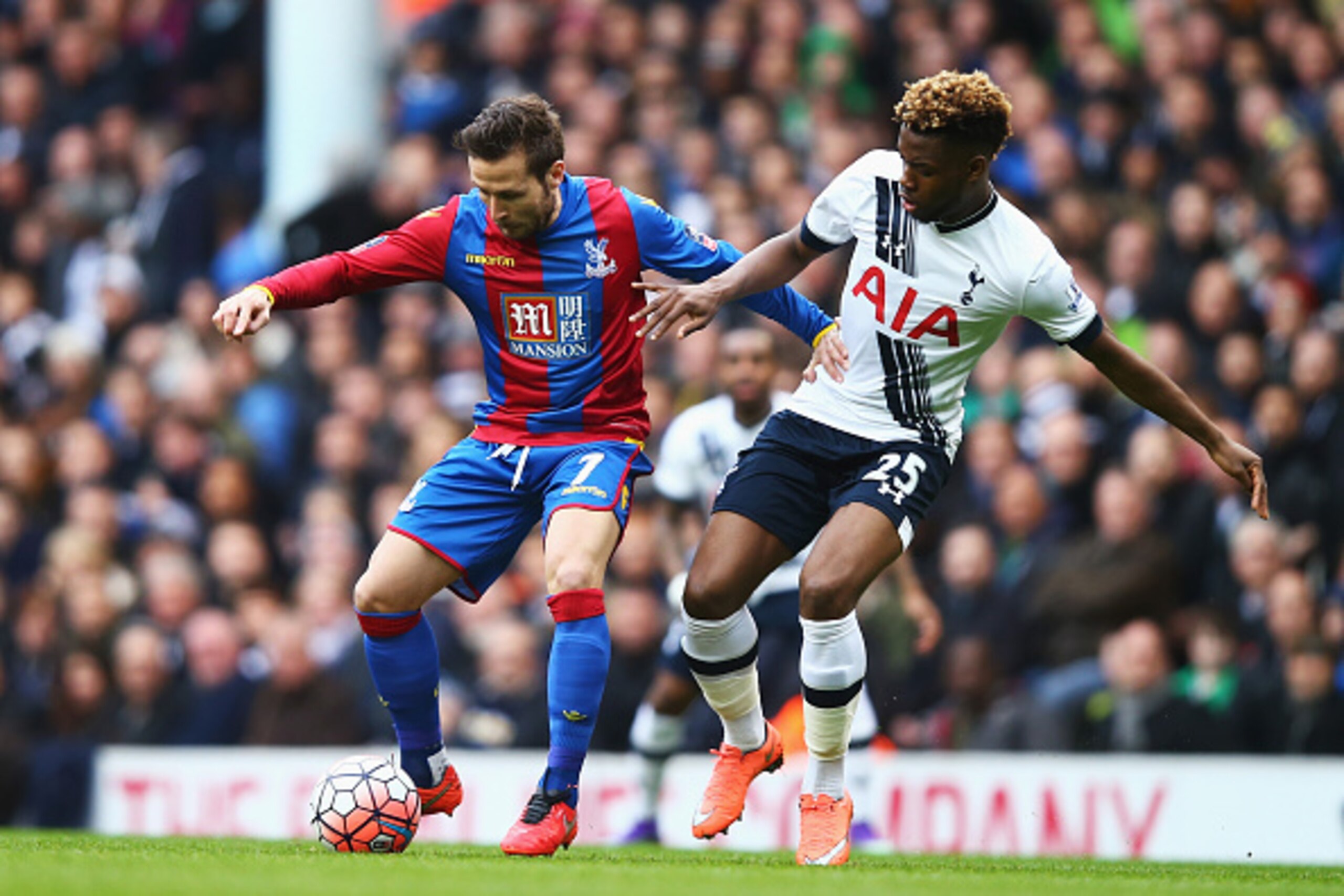 LONDON, ENGLAND - FEBRUARY 21: Yohan Cabaye of Crystal Palace is challenged by Joshua Onomah of Tottenham Hotspur during the Emirates FA Cup Fifth Round match between Tottenham Hotspur and Crystal Palace at White Hart Lane on February 21, 2016 in London, 