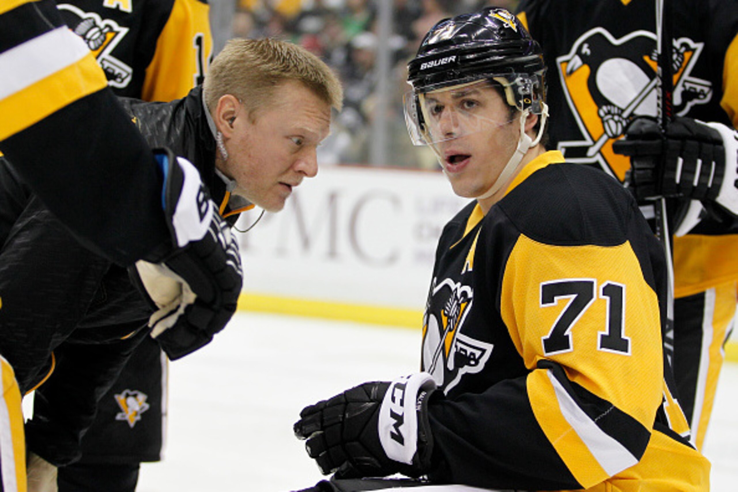 PITTSBURGH, PA - MARCH 14:  Evgeni Malkin #71 of the Pittsburgh Penguins is tended to by medical staff after an injury in the first period during the game against the Boston Bruins at Consol Energy Center on March 14, 2015 in Pittsburgh, Pennsylvania.  (P