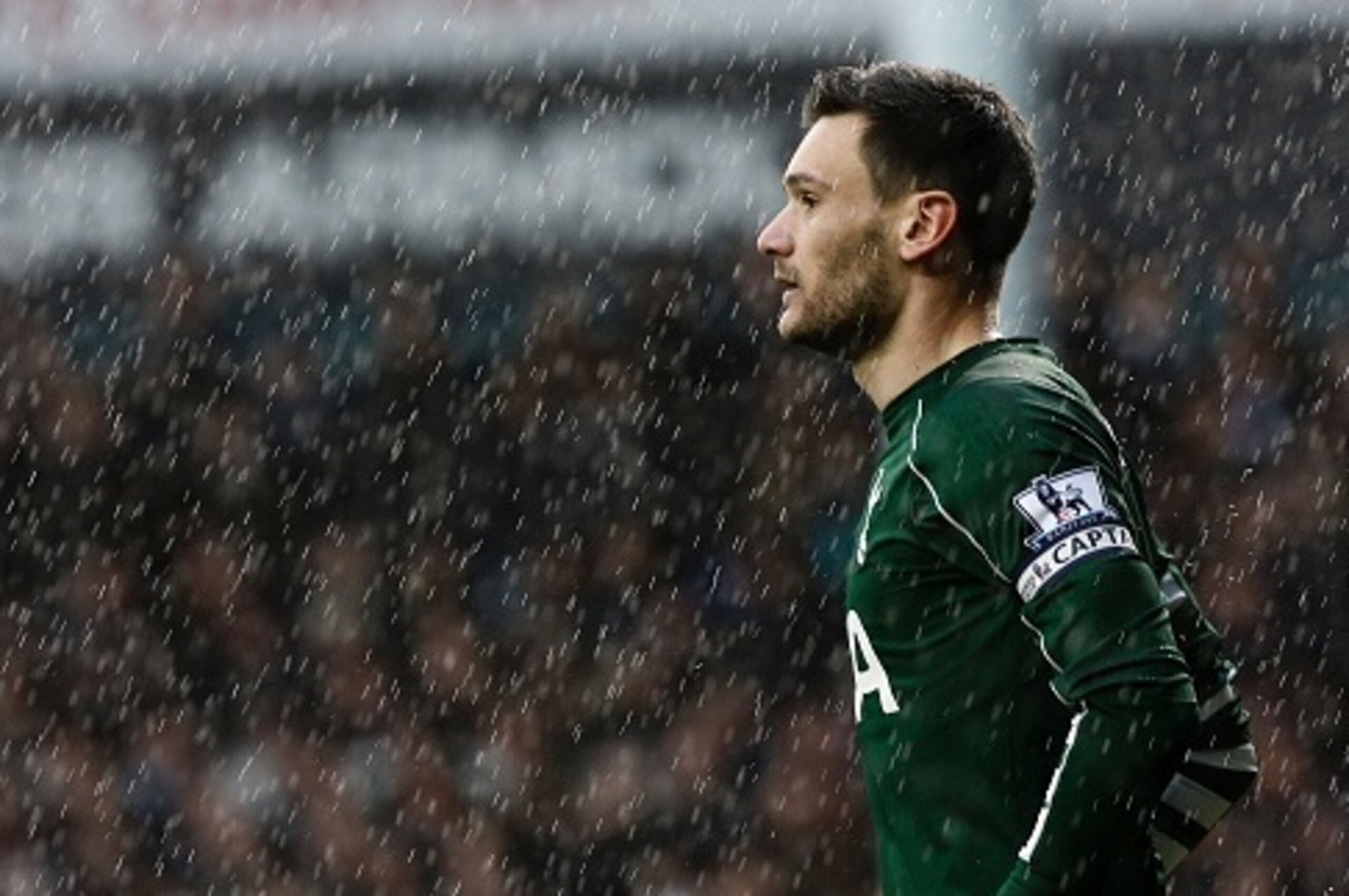 Tottenham Hotspur's French goalkeeper Hugo Lloris is pictured in the rain during the English Premier League football match between Tottenham Hotspur and Arsenal at White Hart Lane in London, on March 5, 2016.
The game finished 2-2. / AFP / ADRIAN DENNIS /