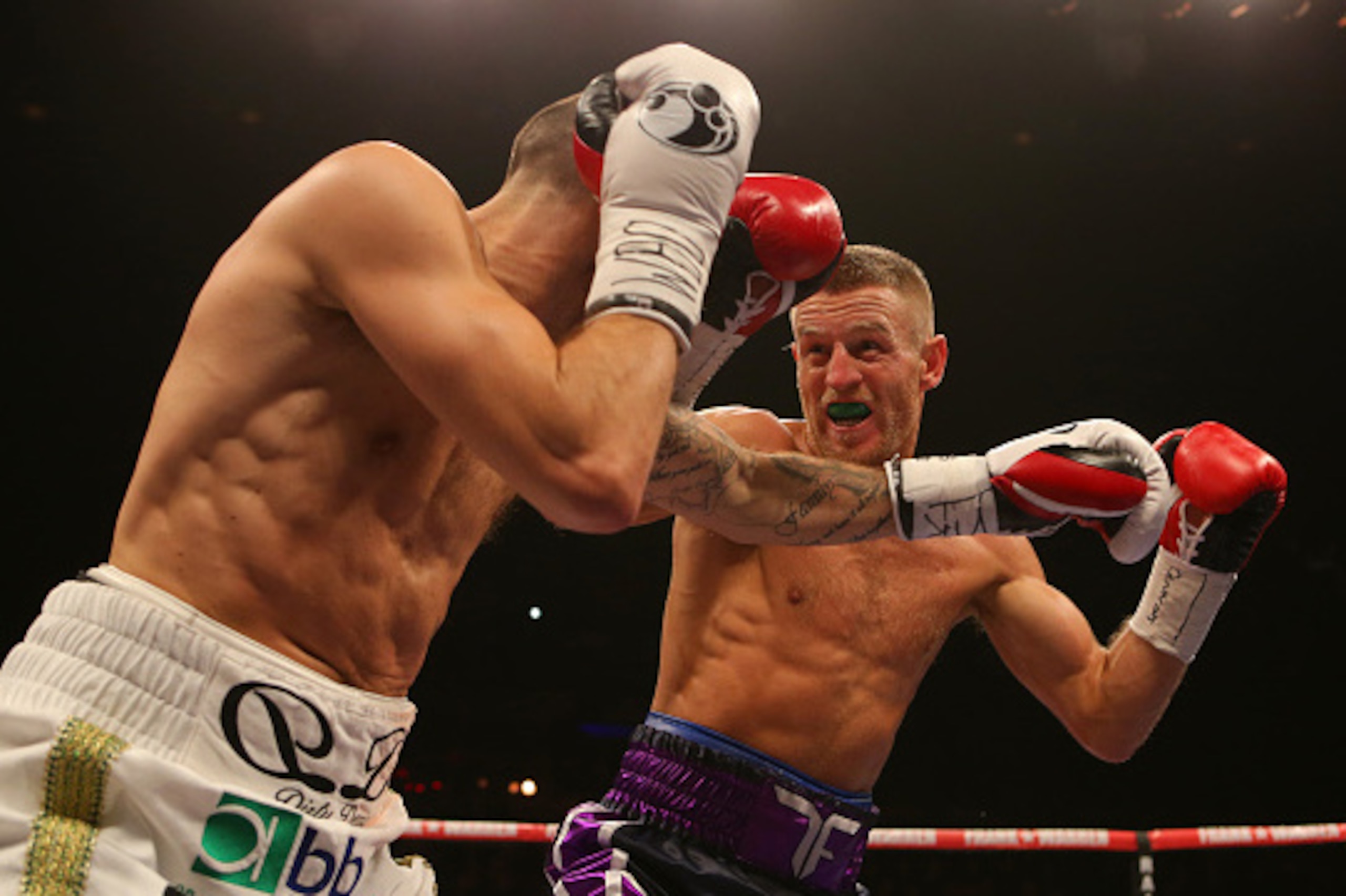 LIVERPOOL, ENGLAND - MARCH 12: Terry Flanagan and Derry Matthews during their WBO World Lightweight Championship bout at the Echo Arena on March 12, 2016 in Liverpool, England. (Photo by Dave Thompson/Getty Images)