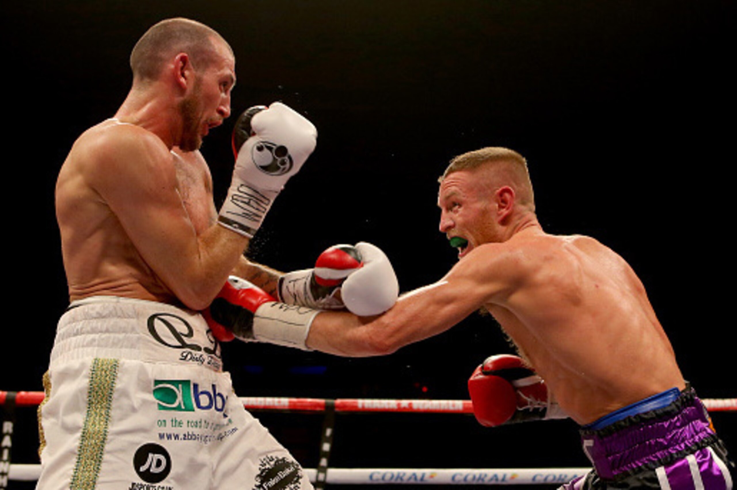 LIVERPOOL, ENGLAND - MARCH 12: Terry Flanagan and Derry Matthews during their WBO World Lightweight Championship bout at the Echo Arena on March 12, 2016 in Liverpool, England. (Photo by Dave Thompson/Getty Images)