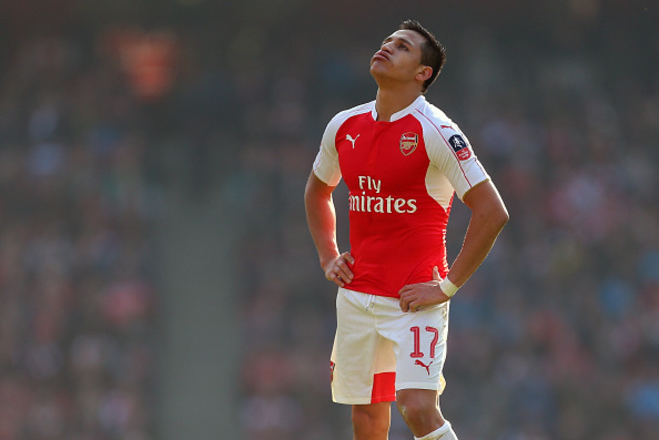 LONDON, ENGLAND - MARCH 13 :  A dejected looking Alexis Sanchez of Arsenal during the Emirates FA Cup match between Arsenal and Watford at the Emirates Stadium on March 13, 2016 in London, England.  (Photo by Catherine Ivill - AMA/Getty Images)