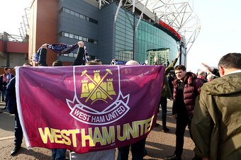 MANCHESTER, ENGLAND - MARCH 13:  West Ham fans wait outside the stadium prior to the Emirates FA Cup sixth round match between Manchester United and West Ham United at Old Trafford on March 13, 2016 in Manchester, England.  (Photo by Clive Brunskill/Getty