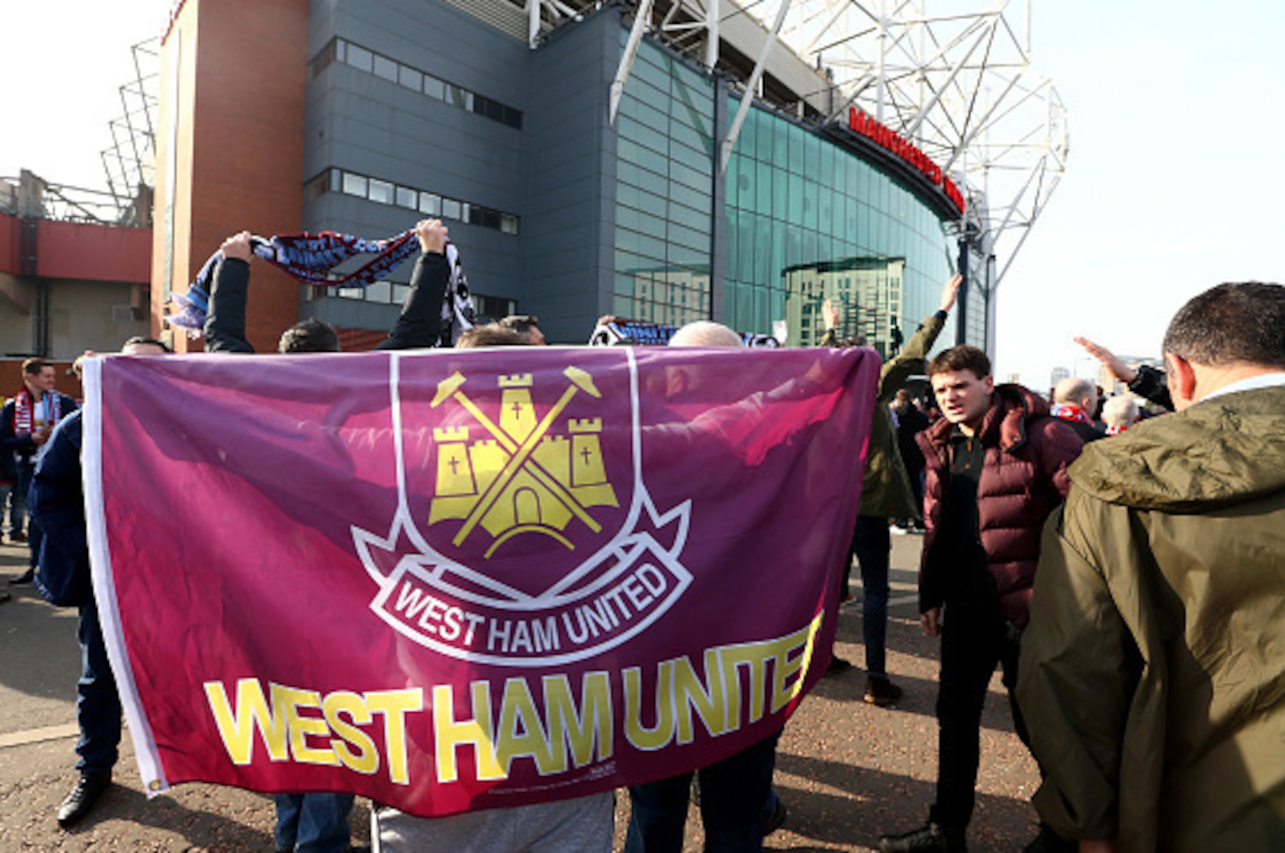 MANCHESTER, ENGLAND - MARCH 13:  West Ham fans wait outside the stadium prior to the Emirates FA Cup sixth round match between Manchester United and West Ham United at Old Trafford on March 13, 2016 in Manchester, England.  (Photo by Clive Brunskill/Getty