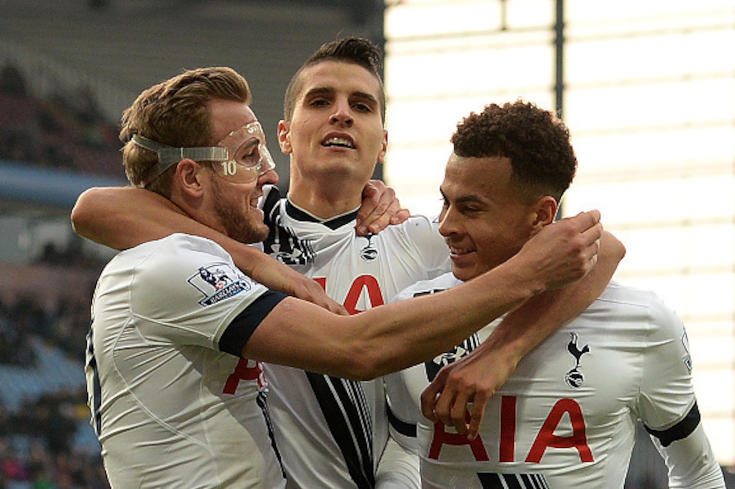 Tottenham Hotspur's English striker Harry Kane (L) celebrates scoring his team's second goal with Tottenham Hotspur's Argentinian midfielder Erik Lamela (C) and Tottenham Hotspur's English midfielder Dele Alli during the English Premier League football ma