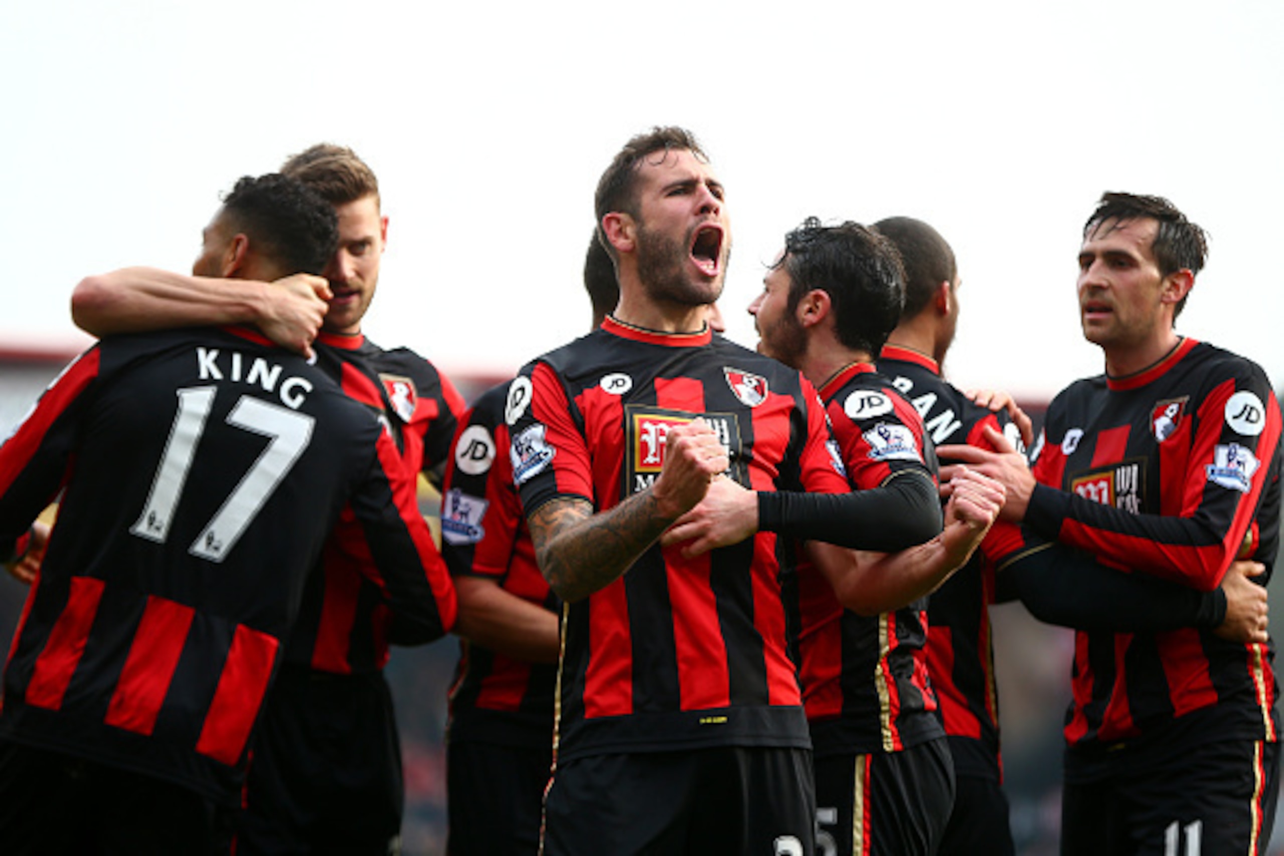 BOURNEMOUTH, ENGLAND - MARCH 12:  Steve Cook (C) of Bournemouth celebrates scoring his team's third goal with his team mates during the Barclays Premier League match between A.F.C. Bournemouth and Swansea City at Vitality Stadium on March 12, 2016 in Bour