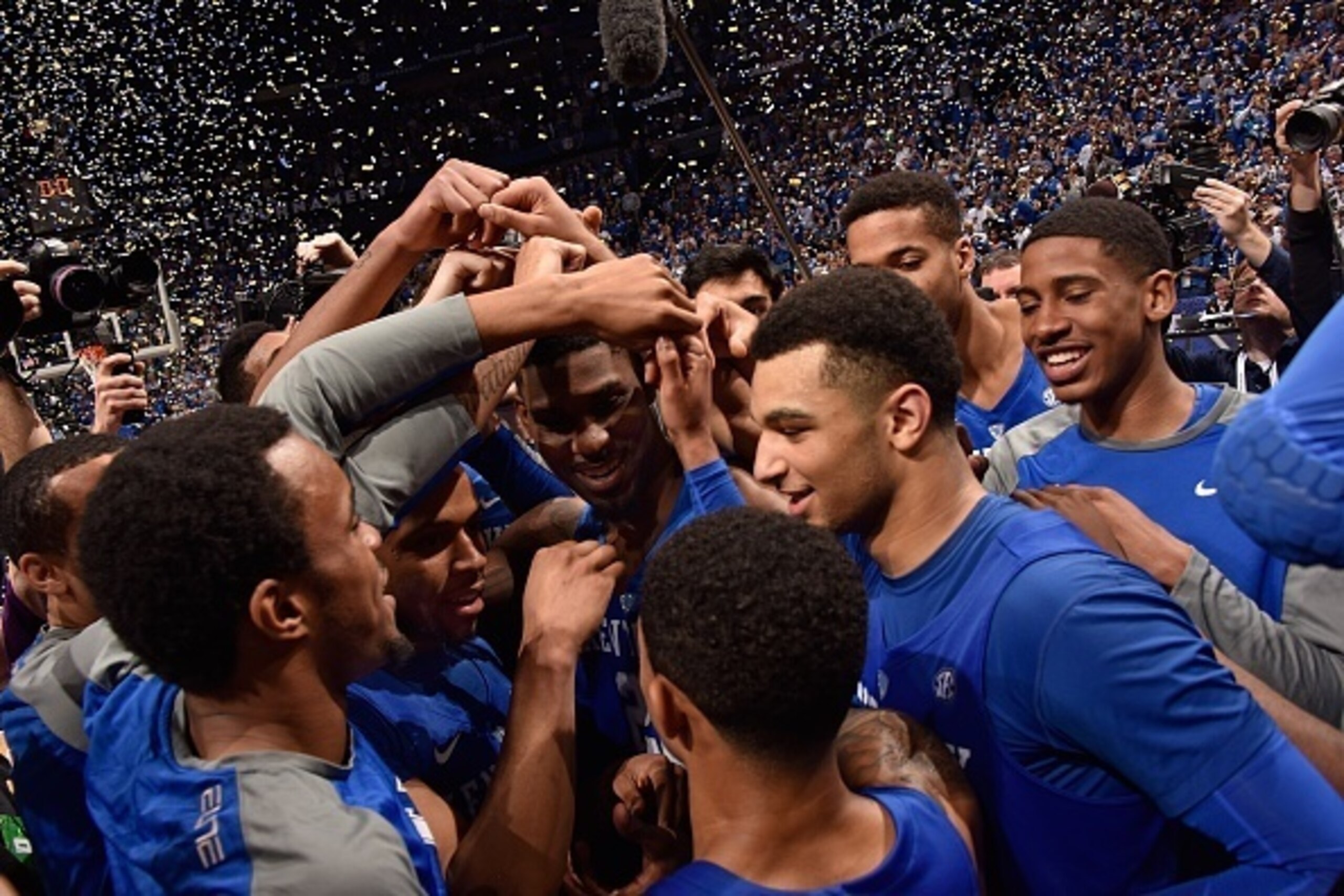 NASHVILLE, TN - MARCH 13:  Jamal Murray #23 of the Kentucky Wildcats celebrates with teammates after an 82-77 overtime victory over the Texas A&M Aggies to win the SEC Basketball Tournament Championship at Bridgestone Arena on March 13, 2016 in Nashville,
