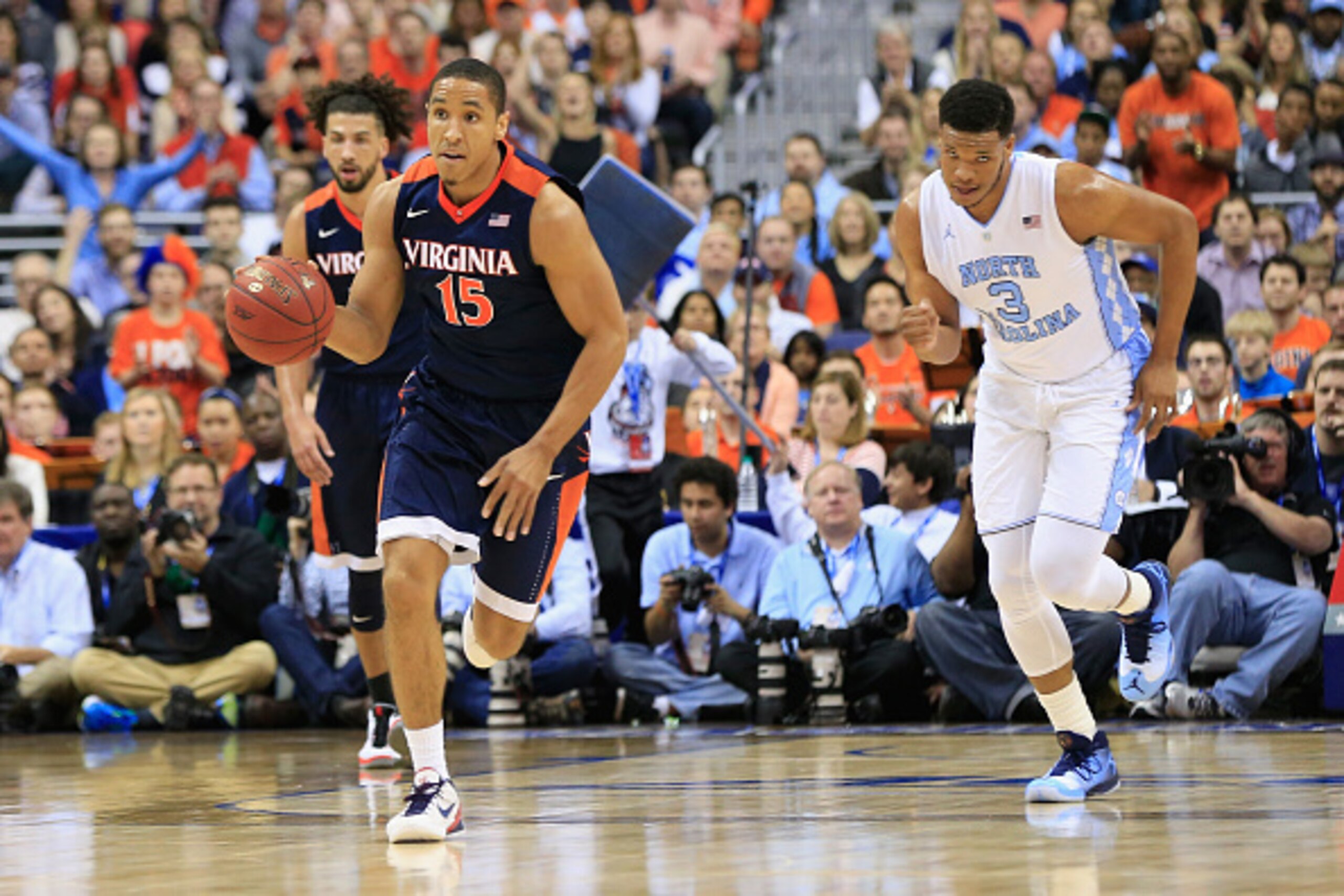 WASHINGTON, DC - MARCH 12: Malcolm Brogdon #15 of the Virginia Cavaliers dribbles the ball in the first half against the North Carolina Tar Heels during the finals of the 2016 ACC Basketball Tournament at Verizon Center on March 12, 2016 in Washington, DC