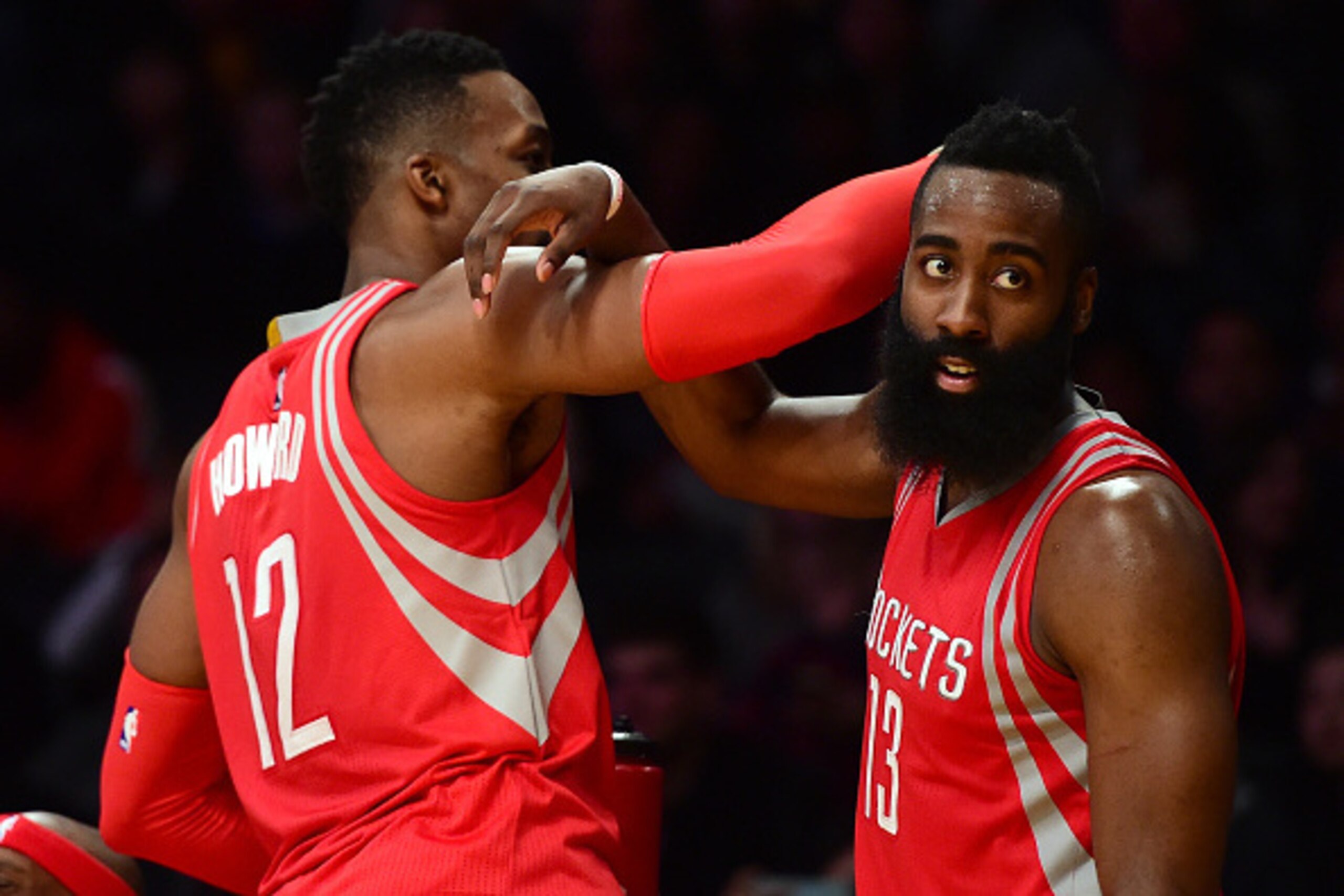 LOS ANGELES, CA - DECEMBER 17:  James Harden #13 and Dwight Howard #12 of the Houston Rockets celebrate a 107-87 win over the Los Angeles Lakers at Staples Center on December 17, 2015 in Los Angeles, California.  NOTE TO USER: User expressly acknowledges 