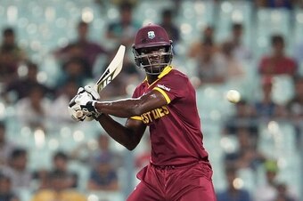 West Indies captain Darren Sammy plays a shot during a practice match between Australia and West Indies during the World T20 cricket tournament at Eden Gardens in Kolkata on March 13, 2016 / AFP / Dibyangshu SARKAR        (Photo credit should read DIBYANG