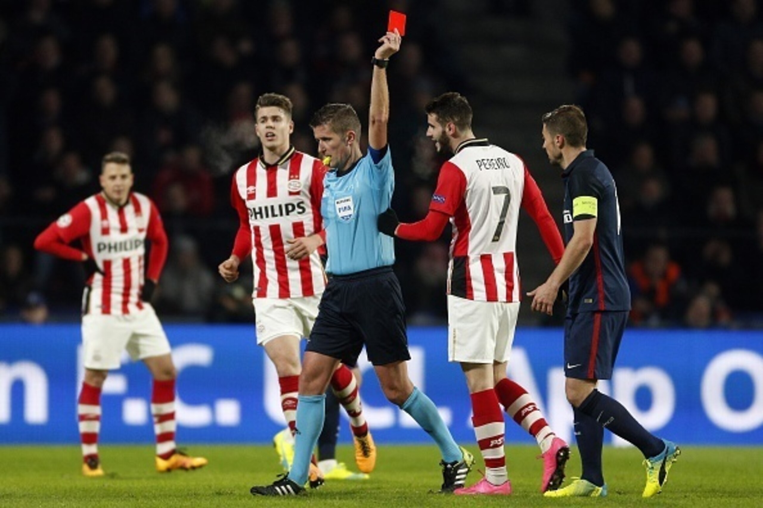 Referee Daniele Orsato (C), Gaston Pereiro of PSV (CR) during the UEFA Champions League Round of 16, First leg match between PSV Eindhoven and Atletico Madrid on February 24, 2016 at the Philips stadium in Eindhoven, The Netherlands.(Photo by VI Images vi