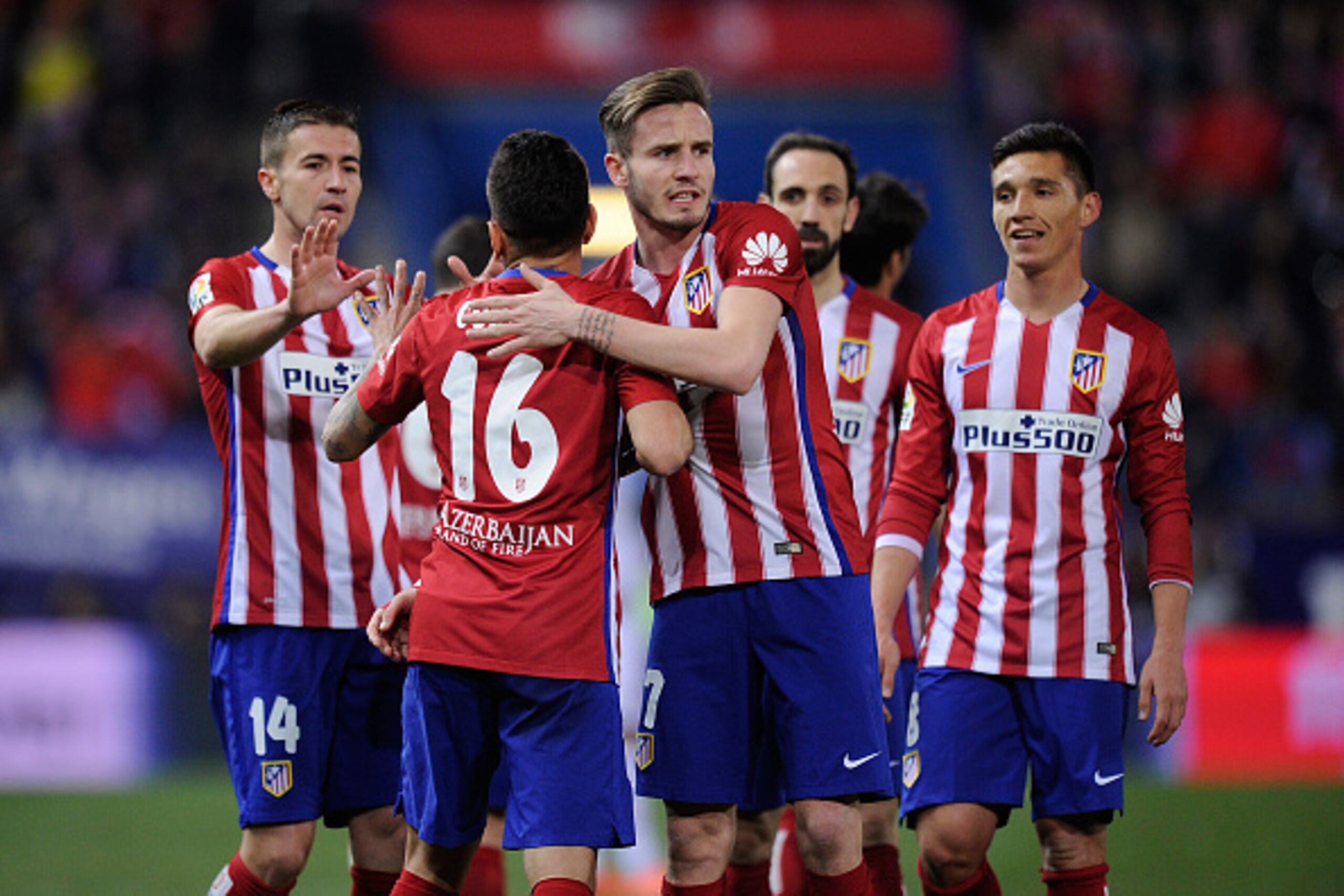 MADRID, SPAIN - MARCH 12:  Angel Correa of Club Atletico de Madrid celebrates with  Saul Niguez after scoring his team's 3rd goal during the La Liga match between Club Atletico de Madrid and RC Deportivo La Coruna at Vicente Calderon Stadium on March 12, 