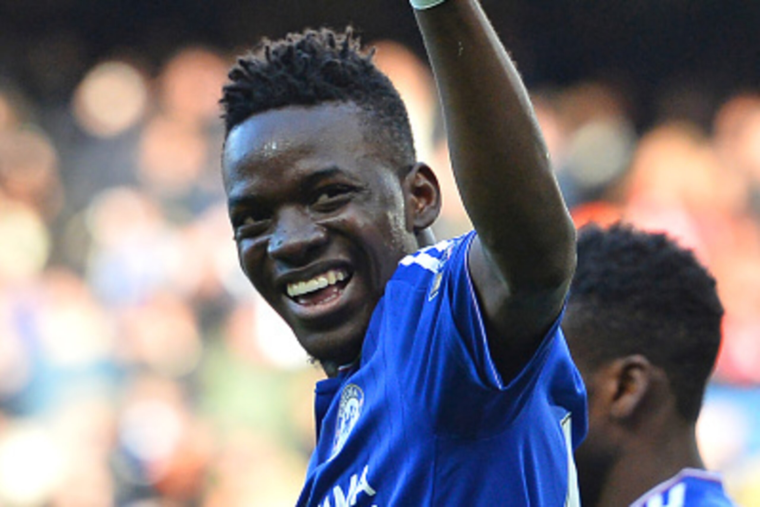 Chelsea's Burkina Faso midfielder Bertrand Traore celebrates after scoring the opening goal of the English Premier League football match between Chelsea and Stoke City at Stamford Bridge in London on March 5, 2016. / AFP / GLYN KIRK / RESTRICTED TO EDITOR