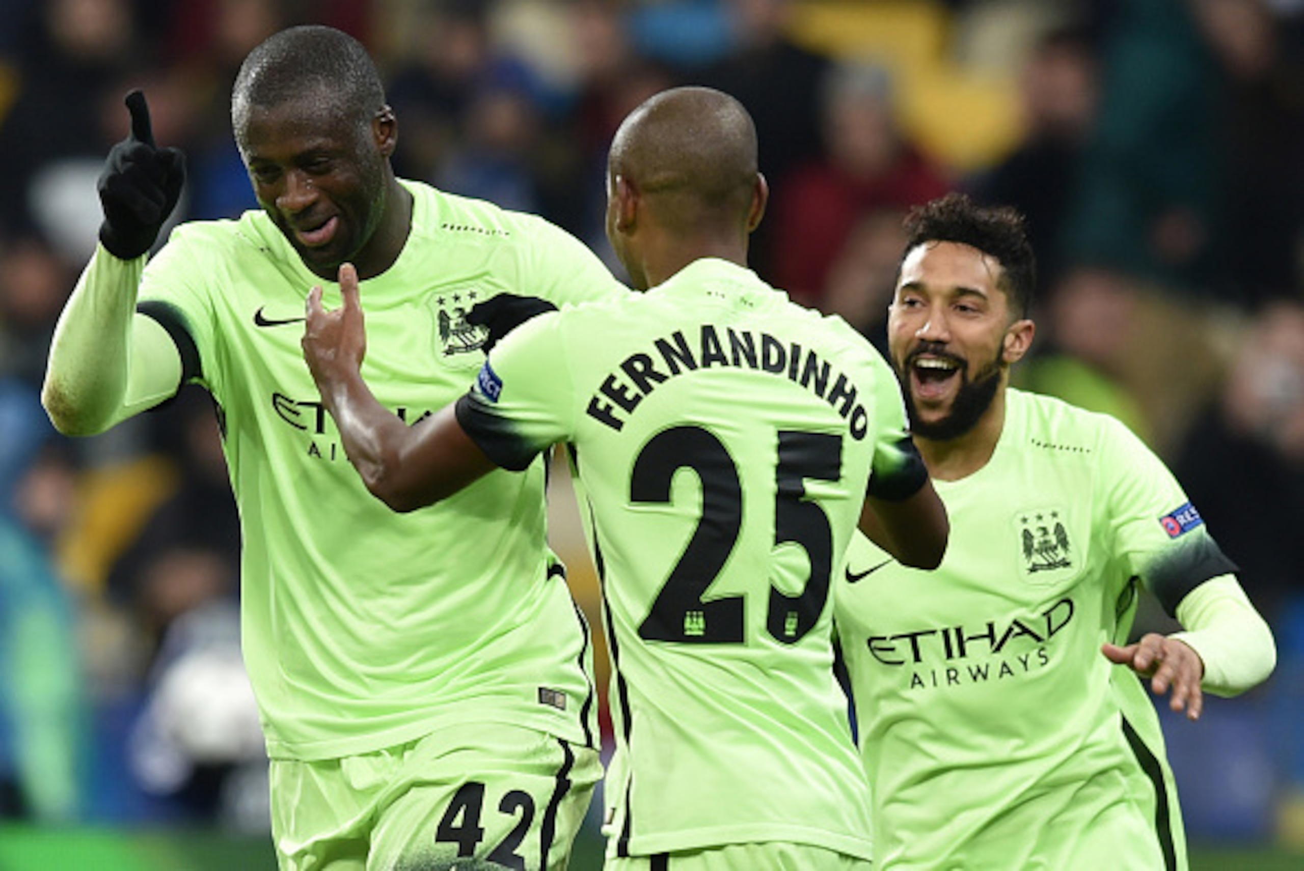 Manchester City's Ivorian midfielder Yaya Toure (L) celebrates after scoring during the UEFA Champions league round of 16, first leg, football match FC Dynamo Kyiv vs Manchester City  FC at the NSC Olimpiski stadium in Kiev on February 24, 2016.  AFP PHOT