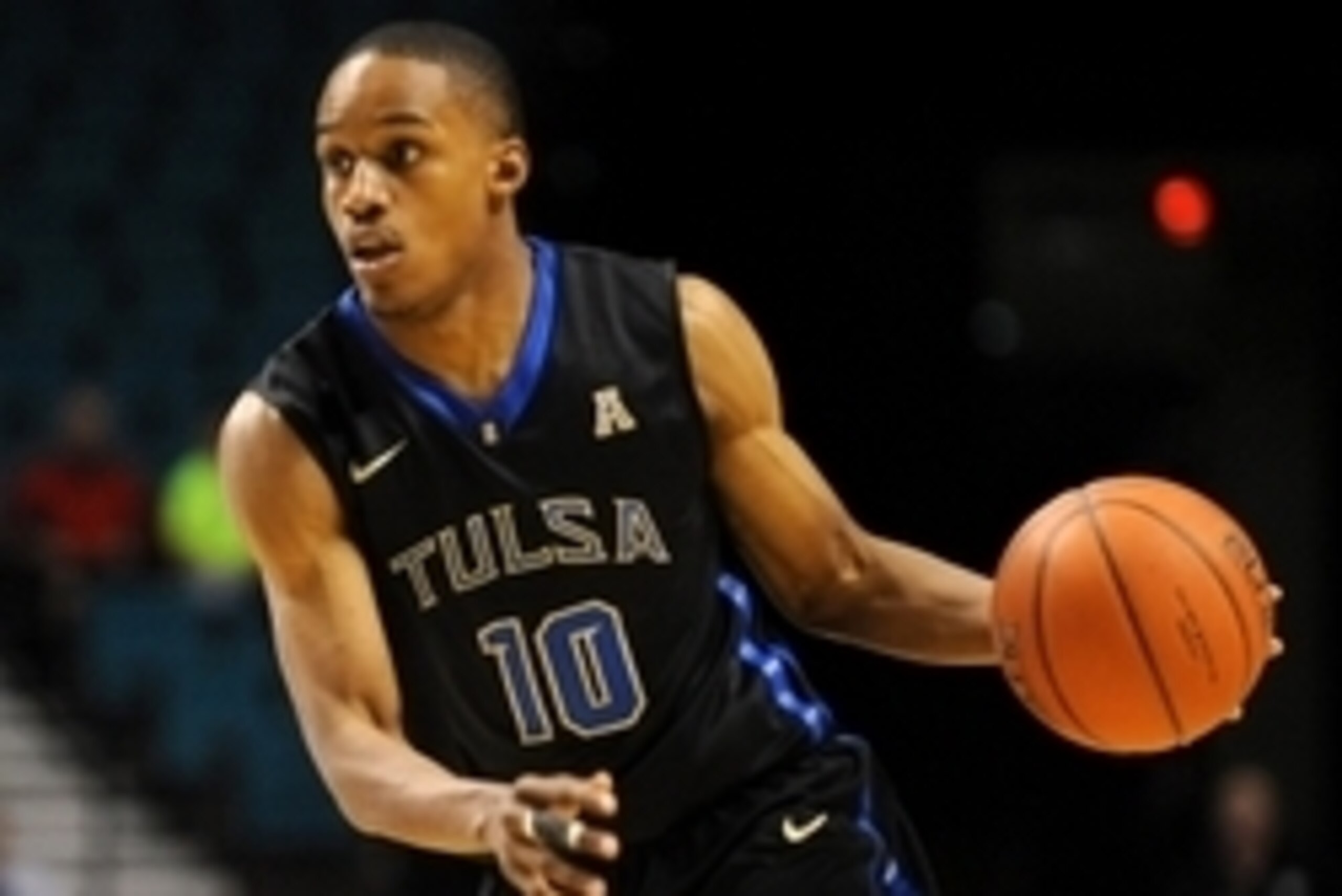 Nov 24, 2014; Las Vegas, NV, USA; Tulsa Golden Hurricane guard James Woodard (10) dribbles the ball during an NCAA basketball game against Auburn at MGM Grand. Mandatory Credit: Stephen R. Sylvanie-USA TODAY Sports Nov 24, 2014; Las Vegas, NV, USA; Tulsa Golden Hurricane guard James Woodard (10) dribbles the ball during an NCAA basketball game against Auburn at MGM Grand. Mandatory Credit: Stephen R. Sylvanie-USA TODAY Sports