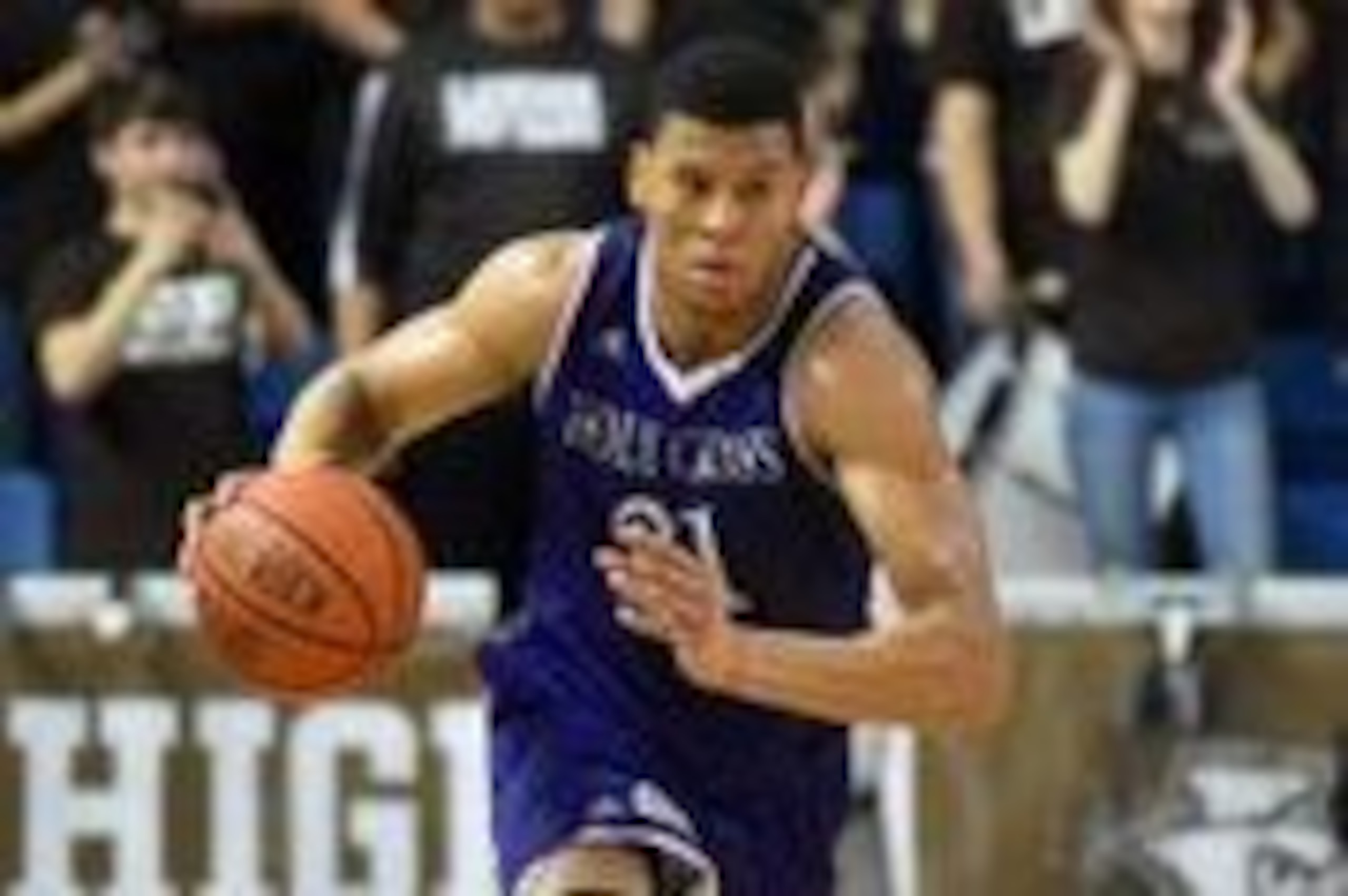Mar 9, 2016; Bethlehem, PA, USA; Holy Cross Crusaders forward Malachi Alexander (21) dribbles in the second hal against the Lehigh Mountain Hawks during the Patriot League final at Stabler Arena. Holy Cross won 59-56. Mandatory Credit: James Lang-USA TODA Mar 9, 2016; Bethlehem, PA, USA; Holy Cross Crusaders forward Malachi Alexander (21) dribbles in the second hal against the Lehigh Mountain Hawks during the Patriot League final at Stabler Arena. Holy Cross won 59-56. Mandatory Credit: James Lang-USA TODA